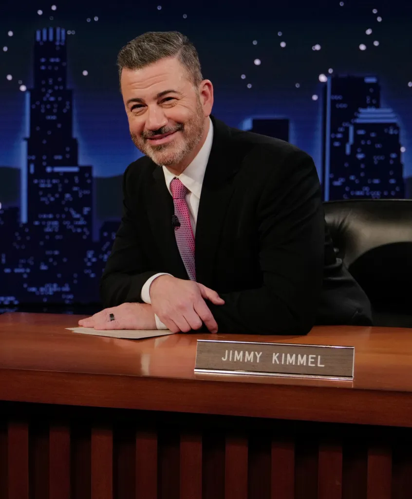 Jimmy Kimmel sits at his desk on 
