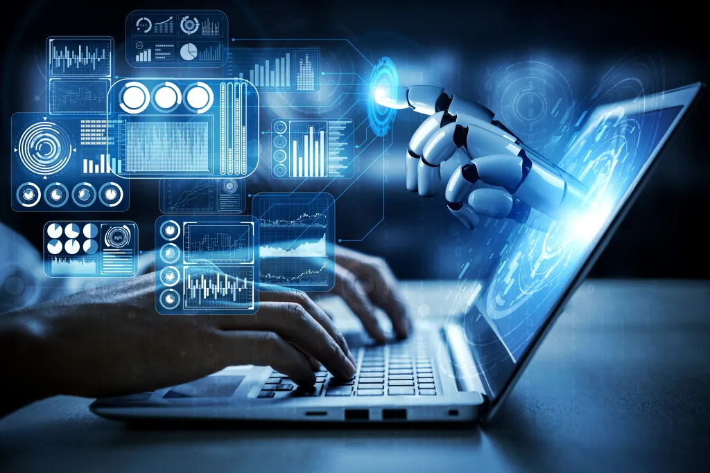 Illustration of a human hand on a laptop keyboard and a robotic hand interacting with a holographic interface of data visualizations.