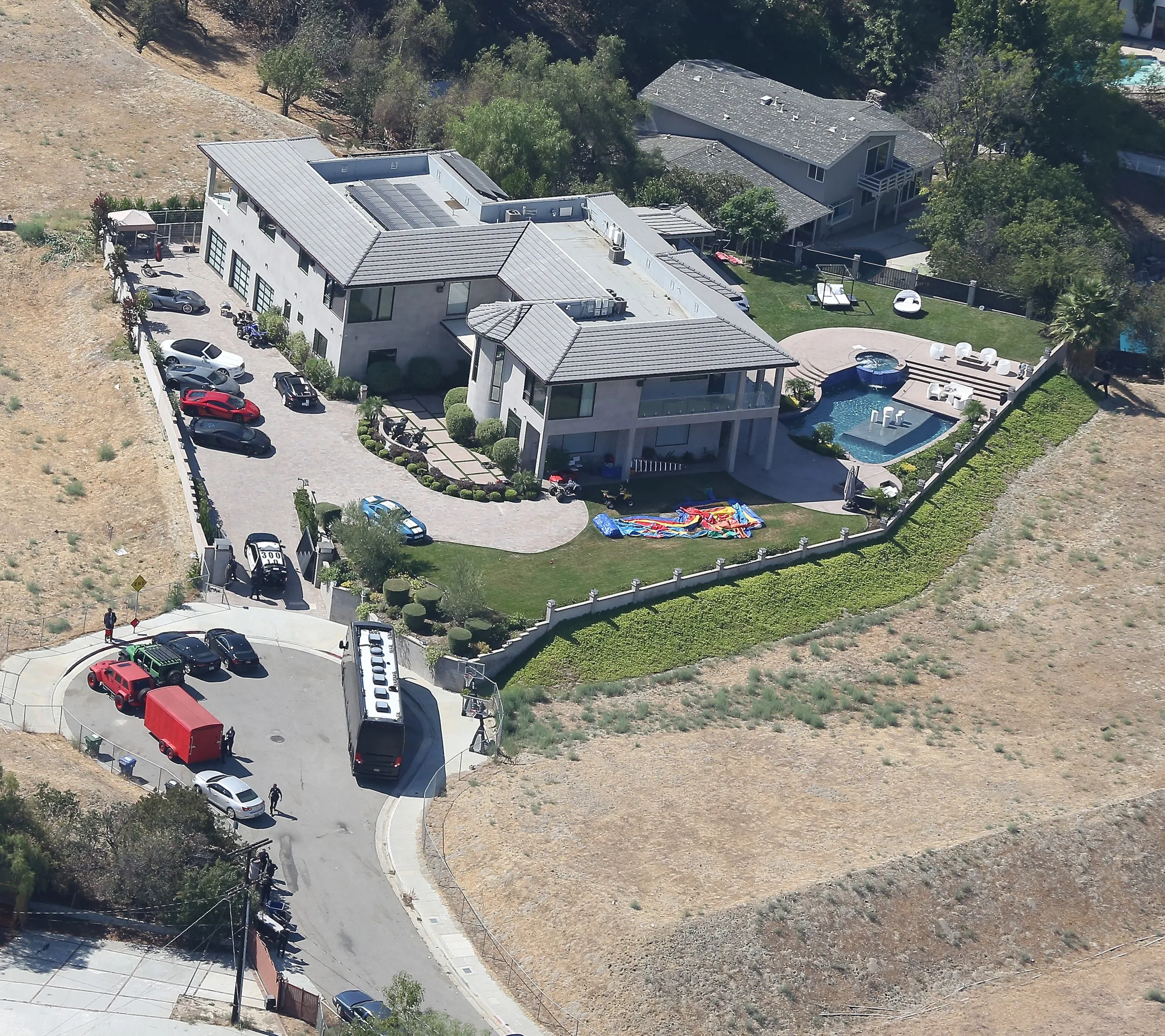 Aerial view of Chris Brown's Tarzana home, where police are conducting a search.