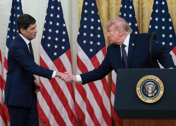 As inflation surges, Fed chief is sworn in by a president who wants rate cuts