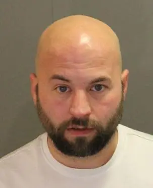 The DoorDash driver, identified as Ryan Turner, then got out of his vehicle and allegedly assaulted Poole, punching him in the head and knocking him to the pavement.