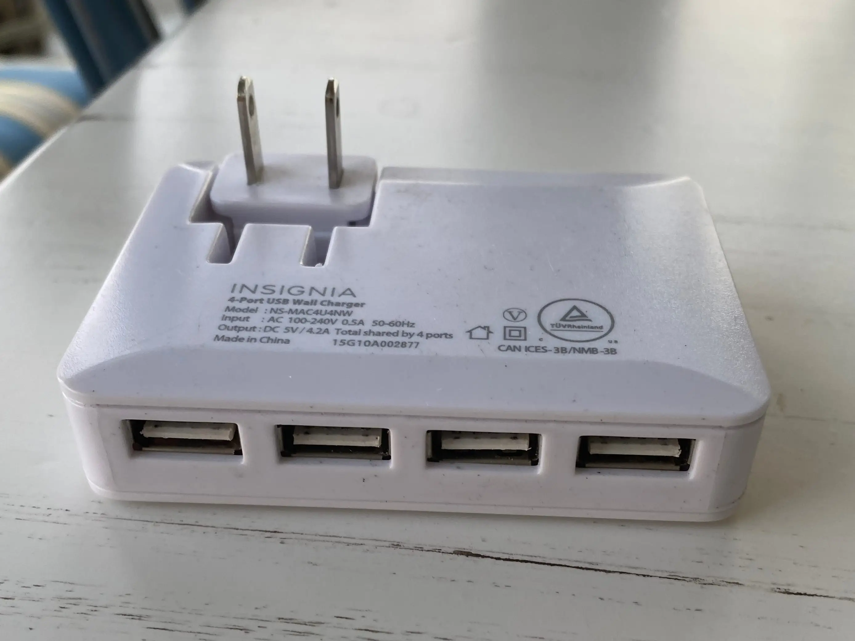 usb port with a plug on a table