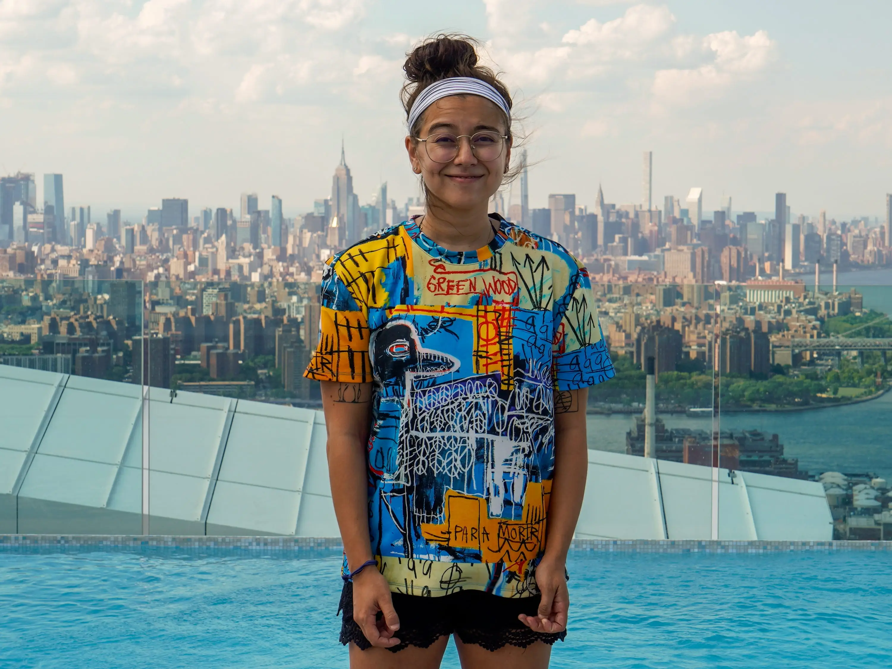 The author in front of the NYC skyline