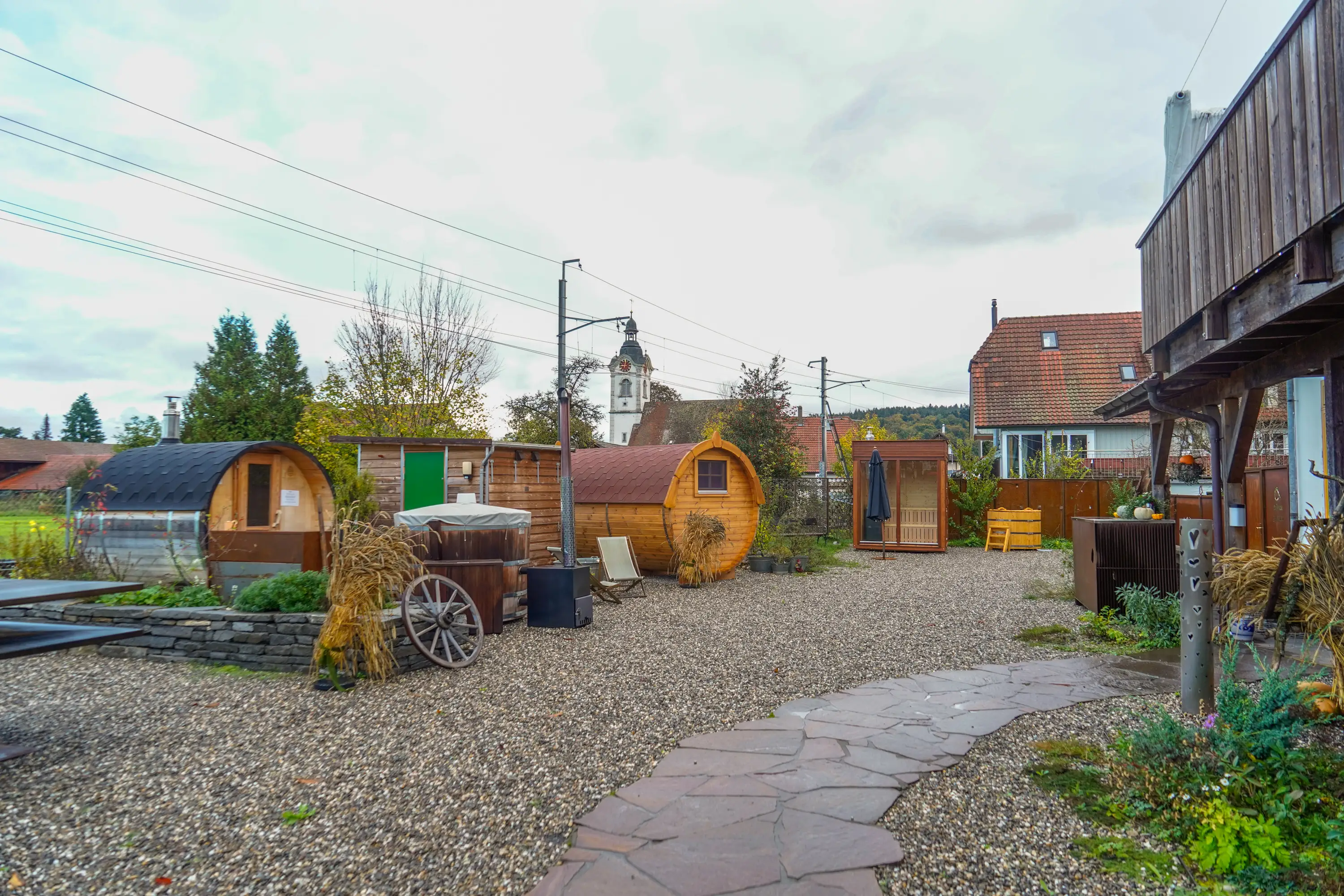 A wide view of the garden where the barrel resides.