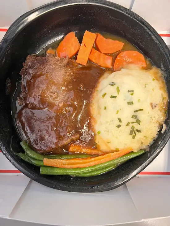The author's third meal of the day; Braised beef and short rib with carrots, potatoes, and green beans.