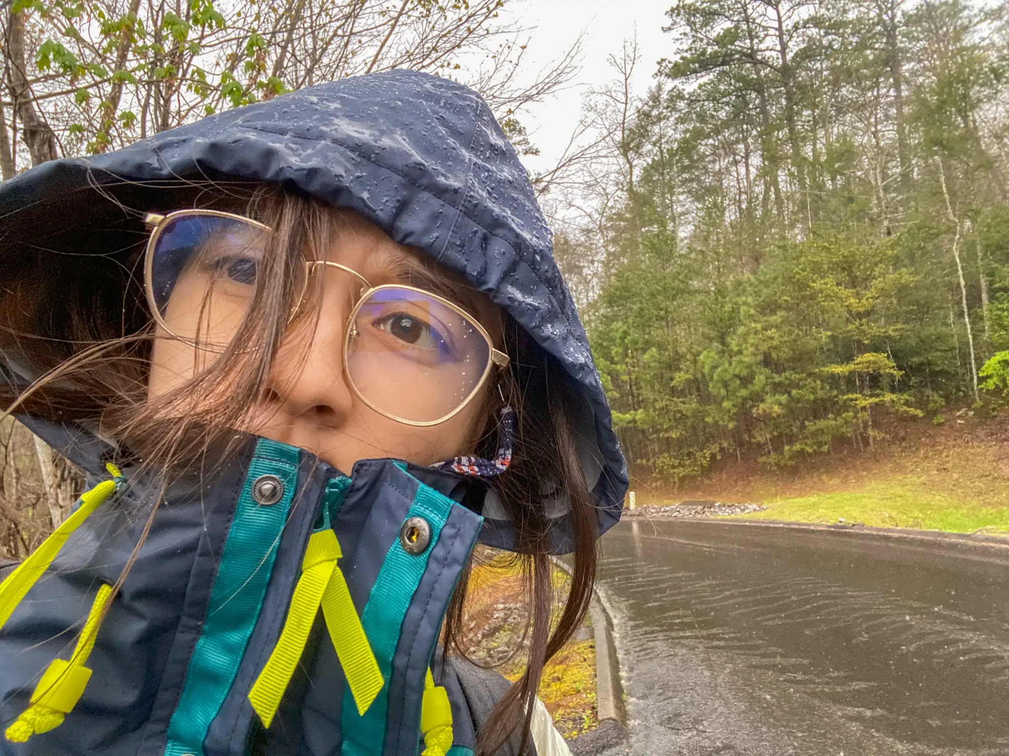 The author braces the rain.