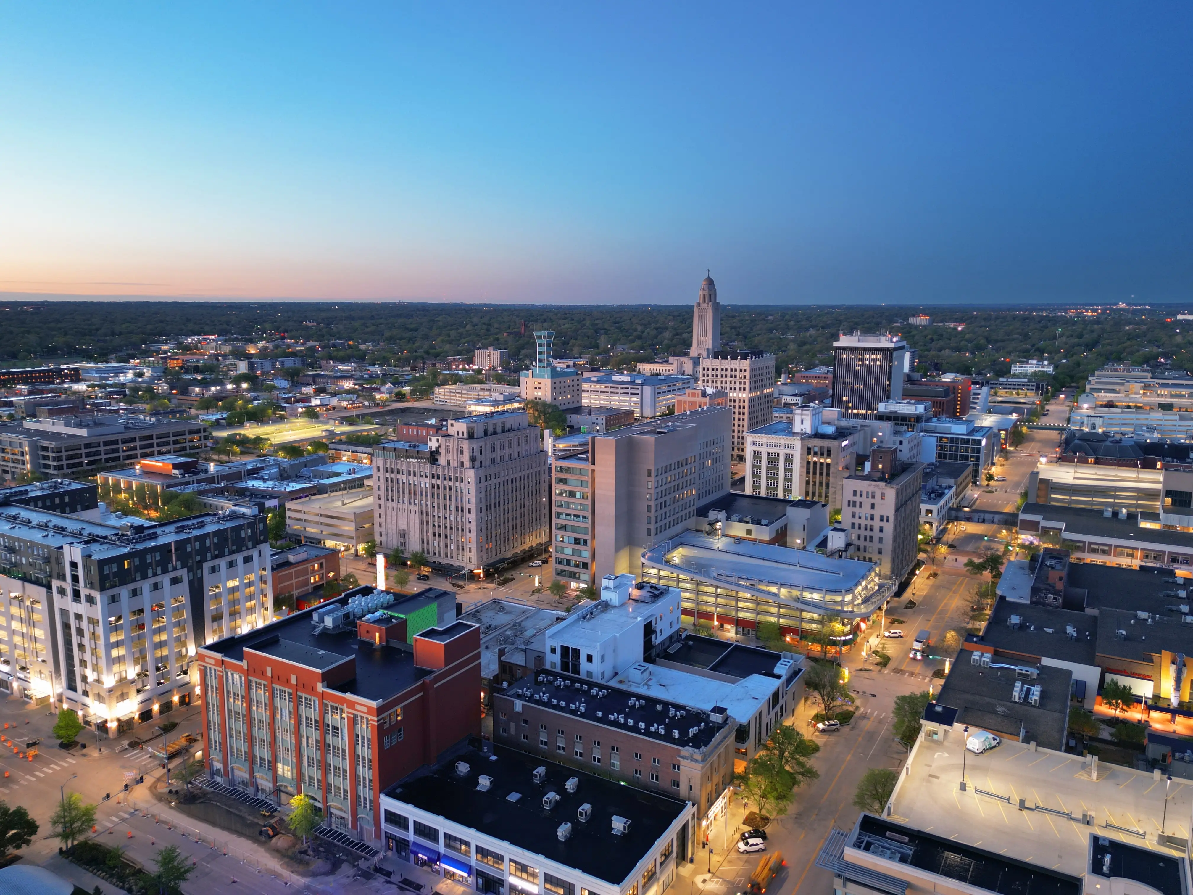 An aerial view of Lincoln, Nebraska, at dusk.
