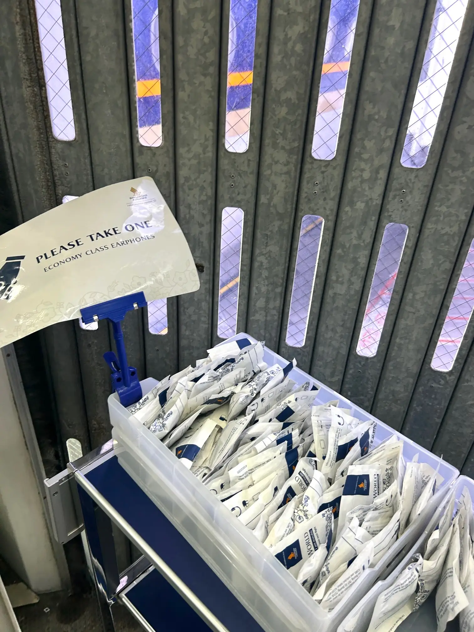 Singapore Airlines headphones basket