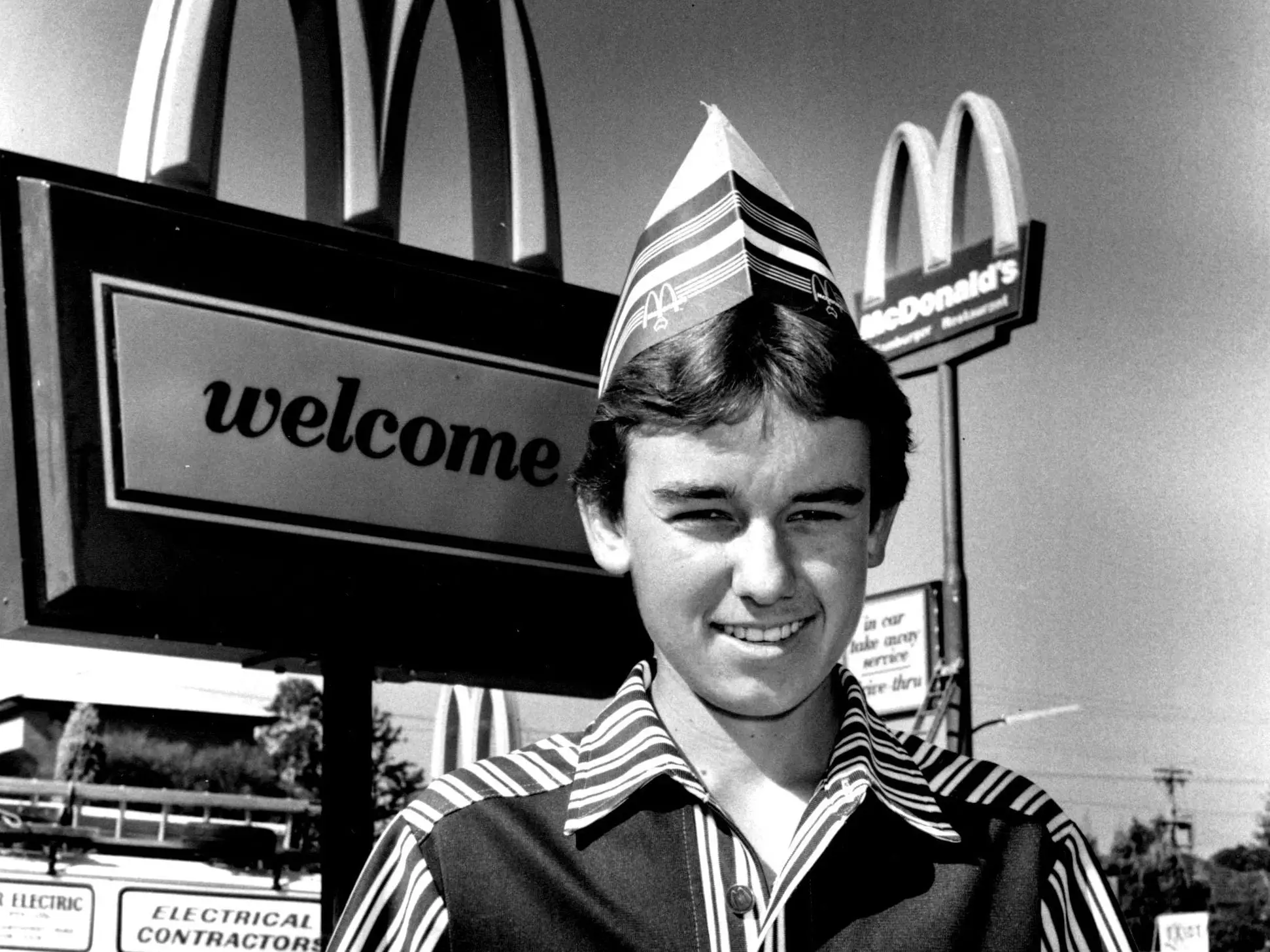 A young employee holding a tray of McDonald's food on May 9, 1986.