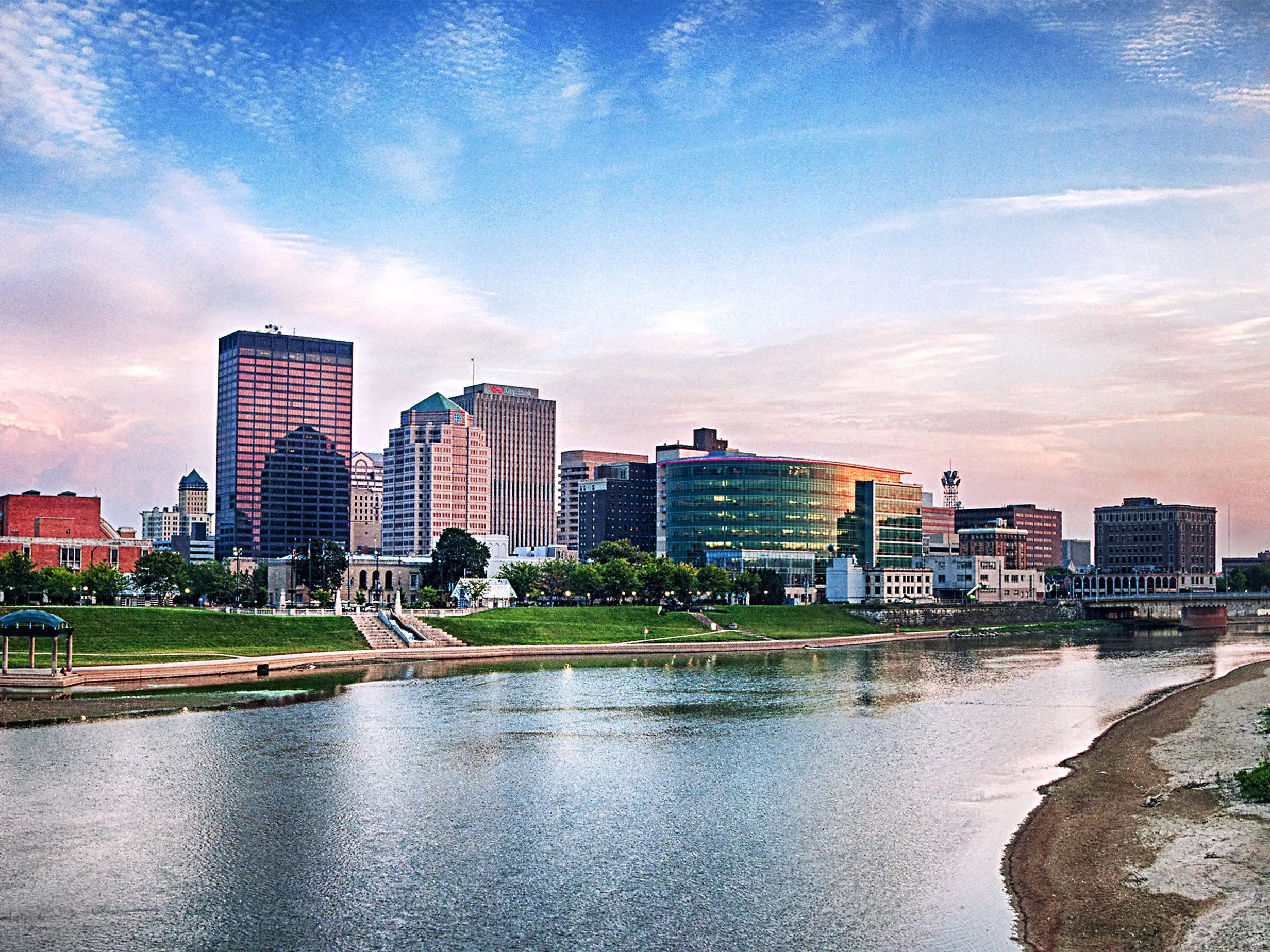 The skyline of Dayton, Ohio at dusk on the riverfront.