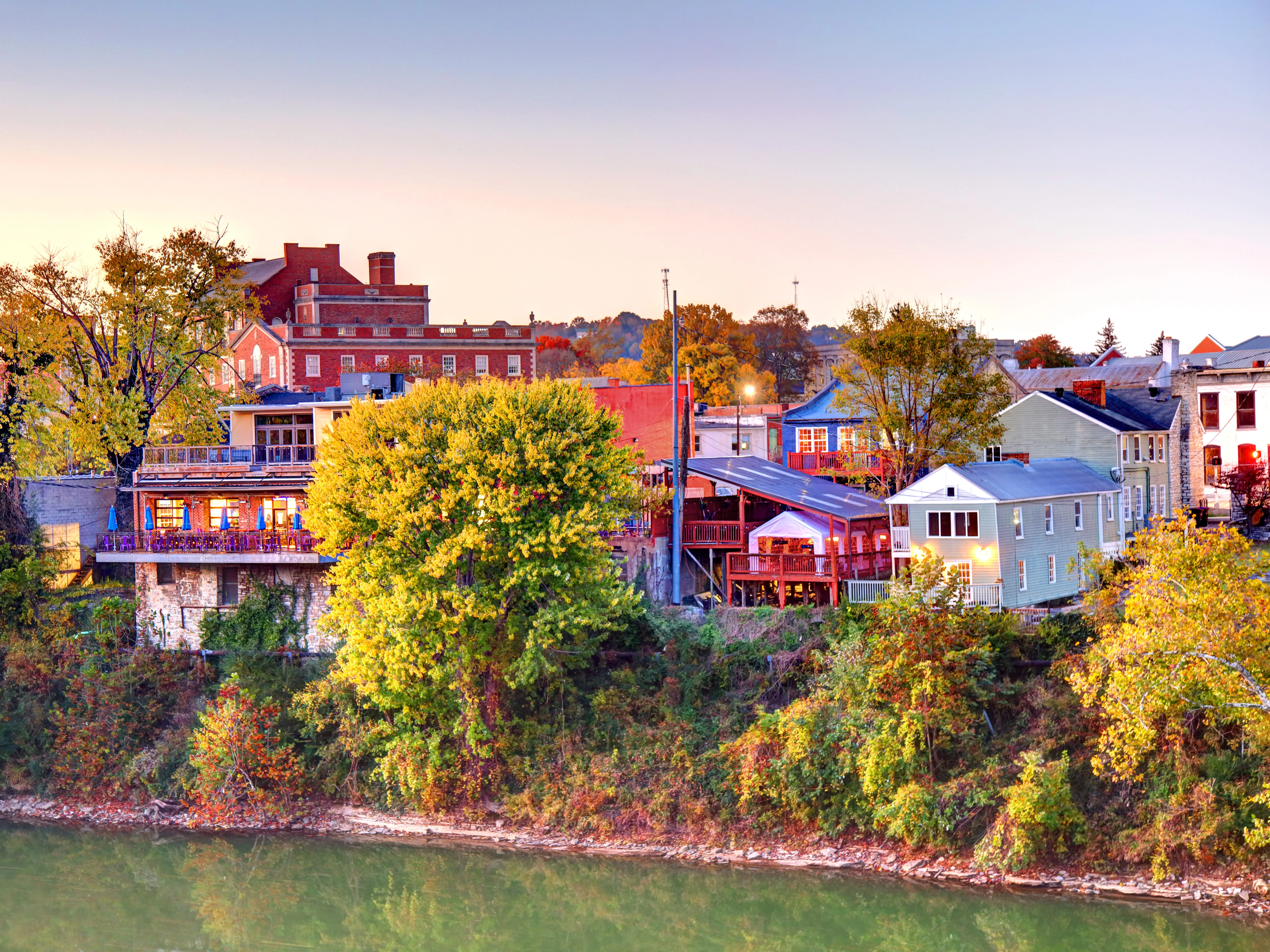 The riverfront of Frankfort, Kentucky with brick factories and family homes.