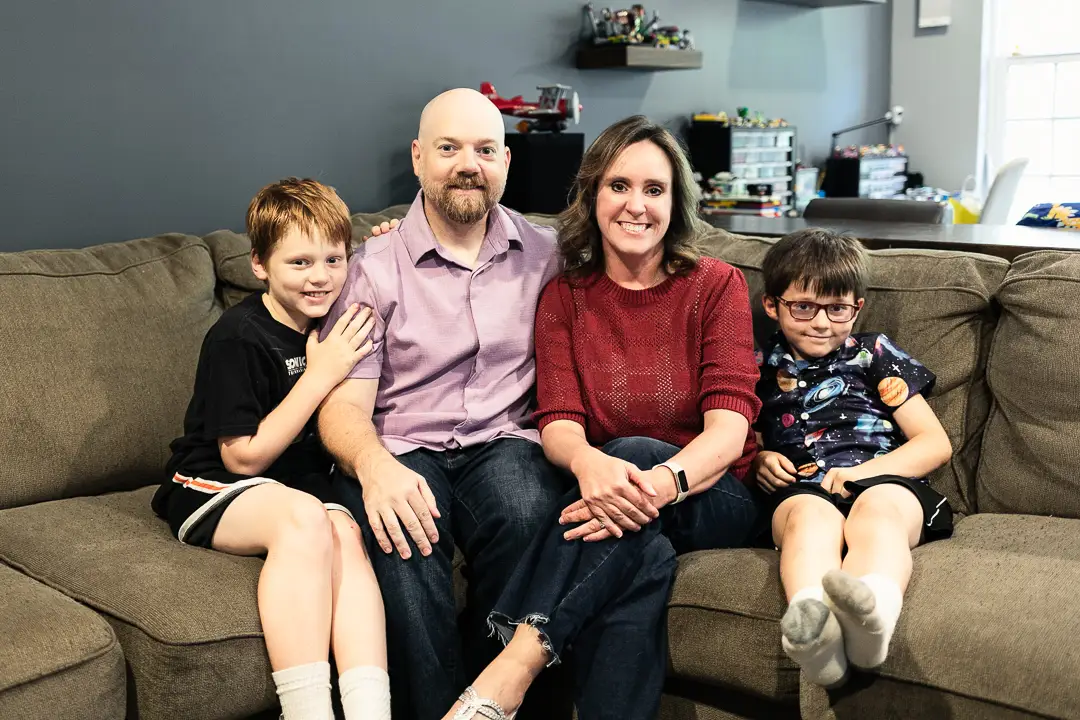 Ana Reisdorf family on the couch