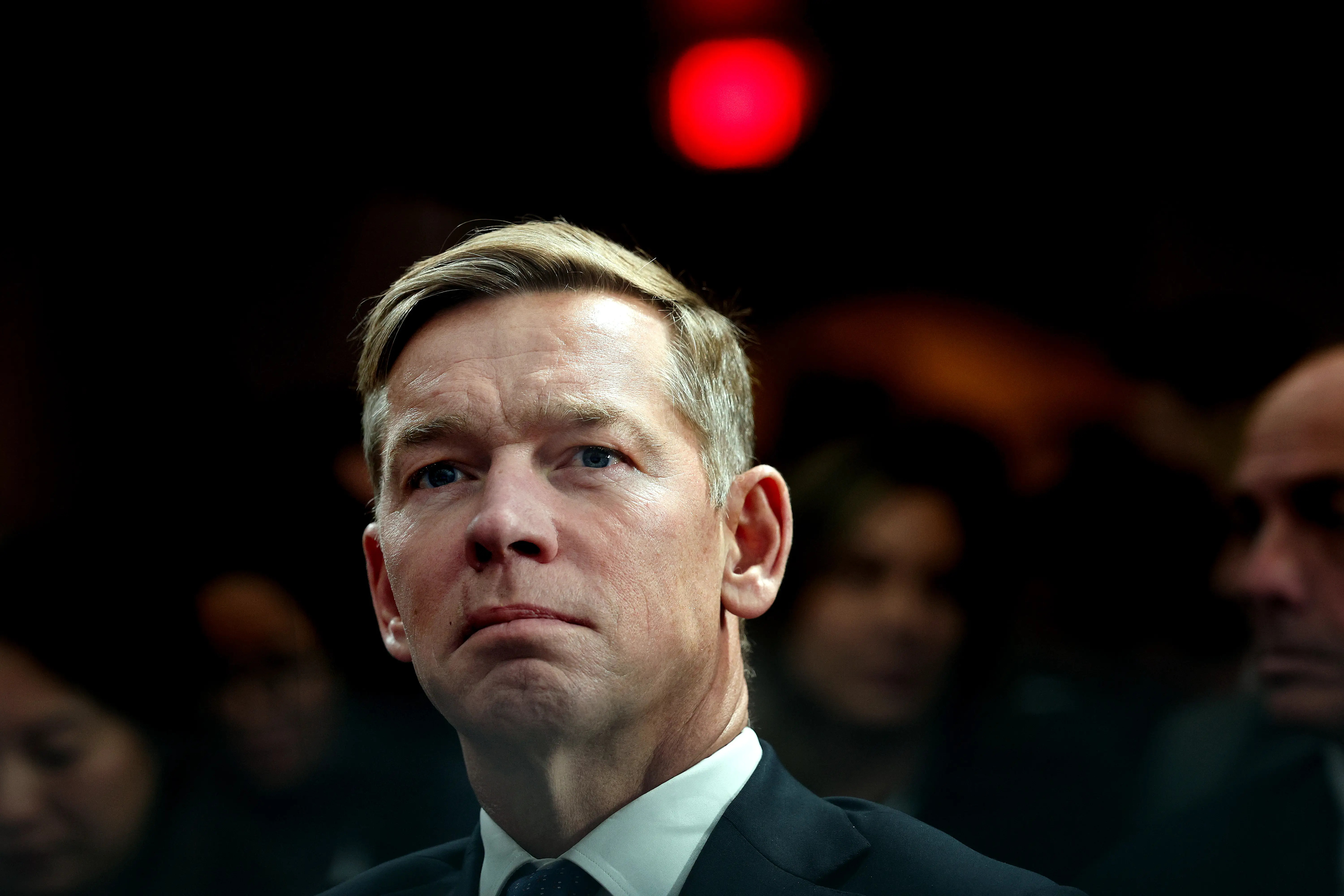 McDonald's President and CEO Chris Kempczinski listens as U.S. President Donald Trump delivers remarks at the McDonald's Impact Summit at the Westin DC Downtown on November 17, 2025.
