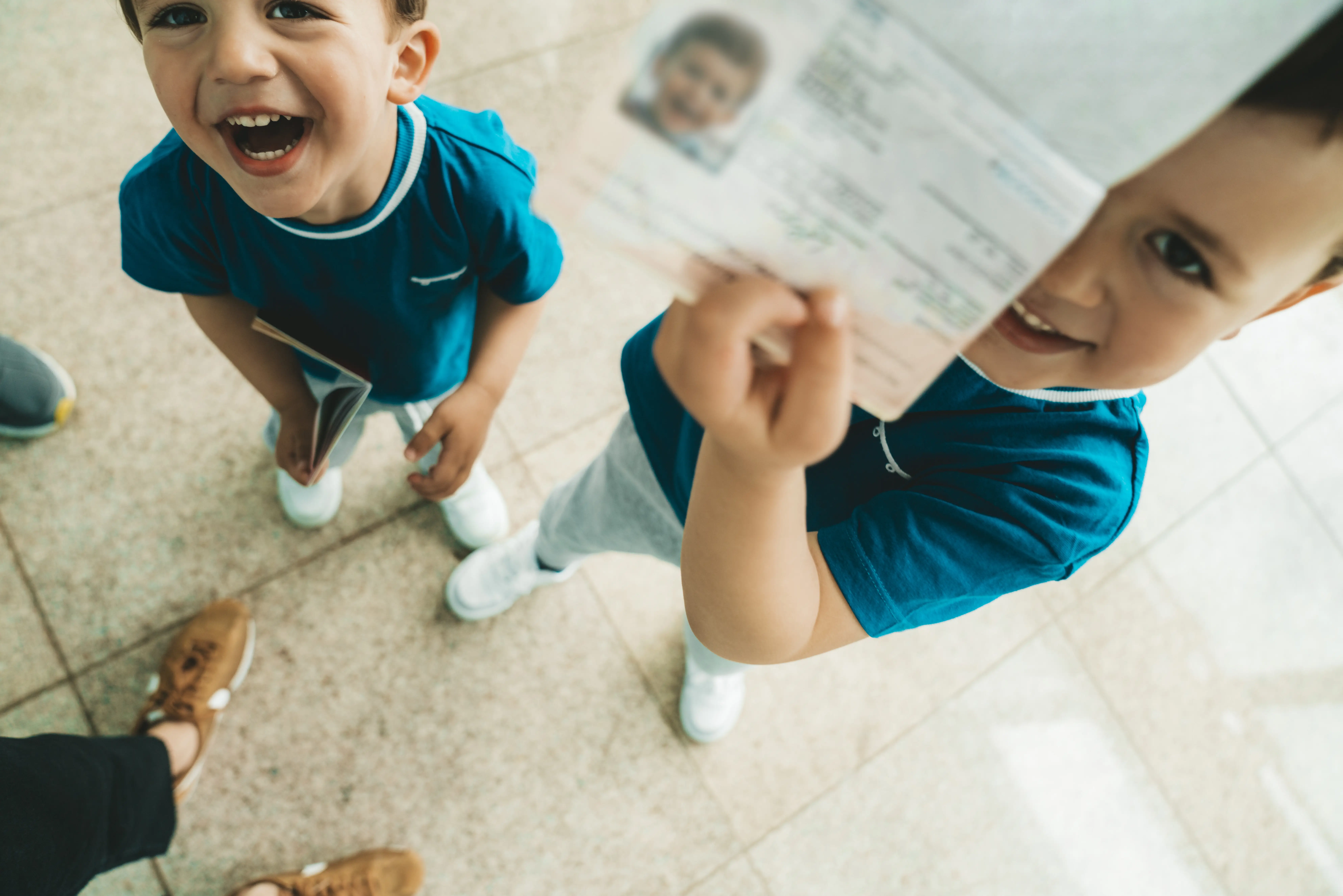 Kids showing passport