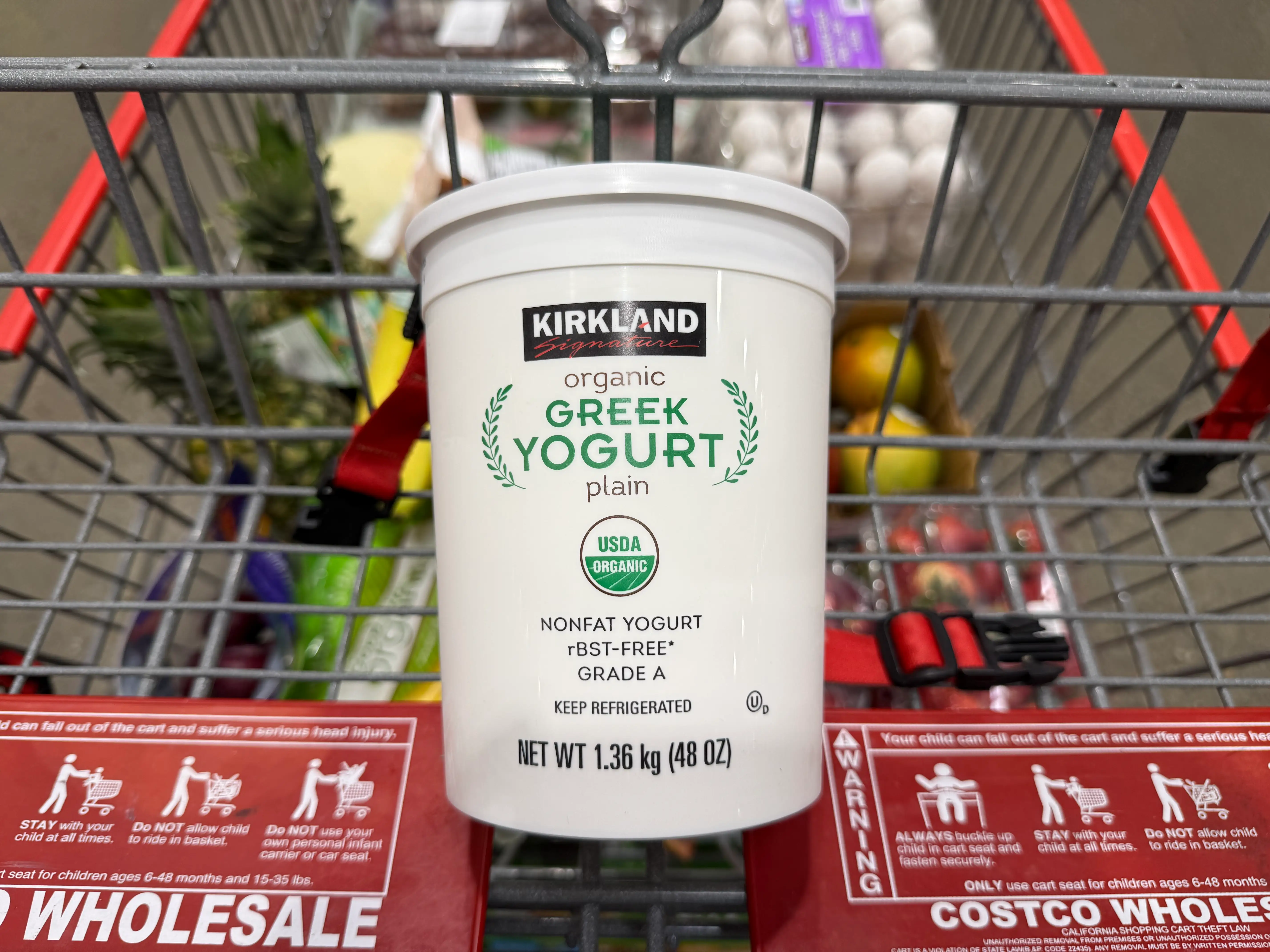 Kirkland Signature greek. yogurt in cart at Costco