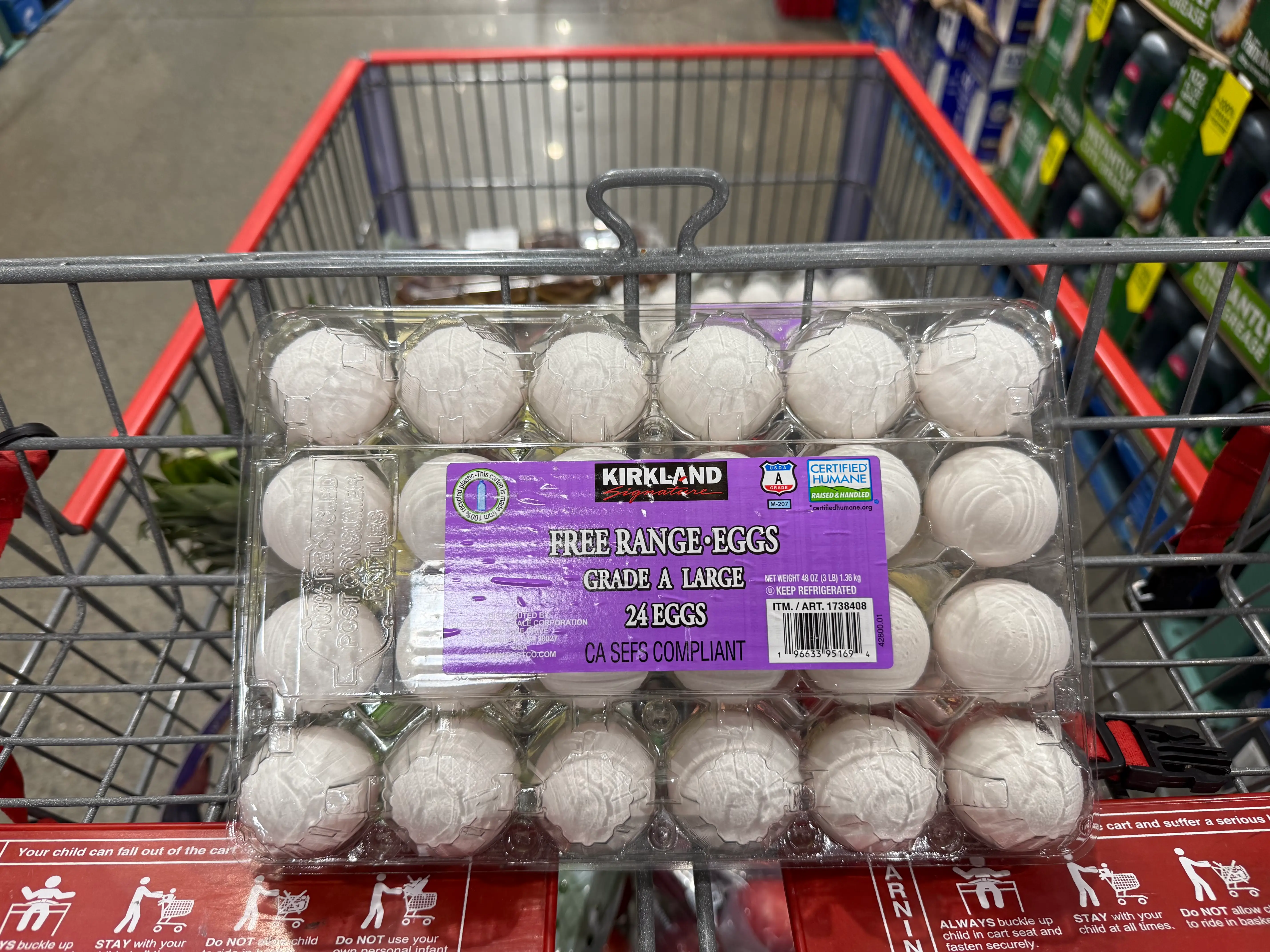 Kirkland Signature 24-count eggs in cart at Costco
