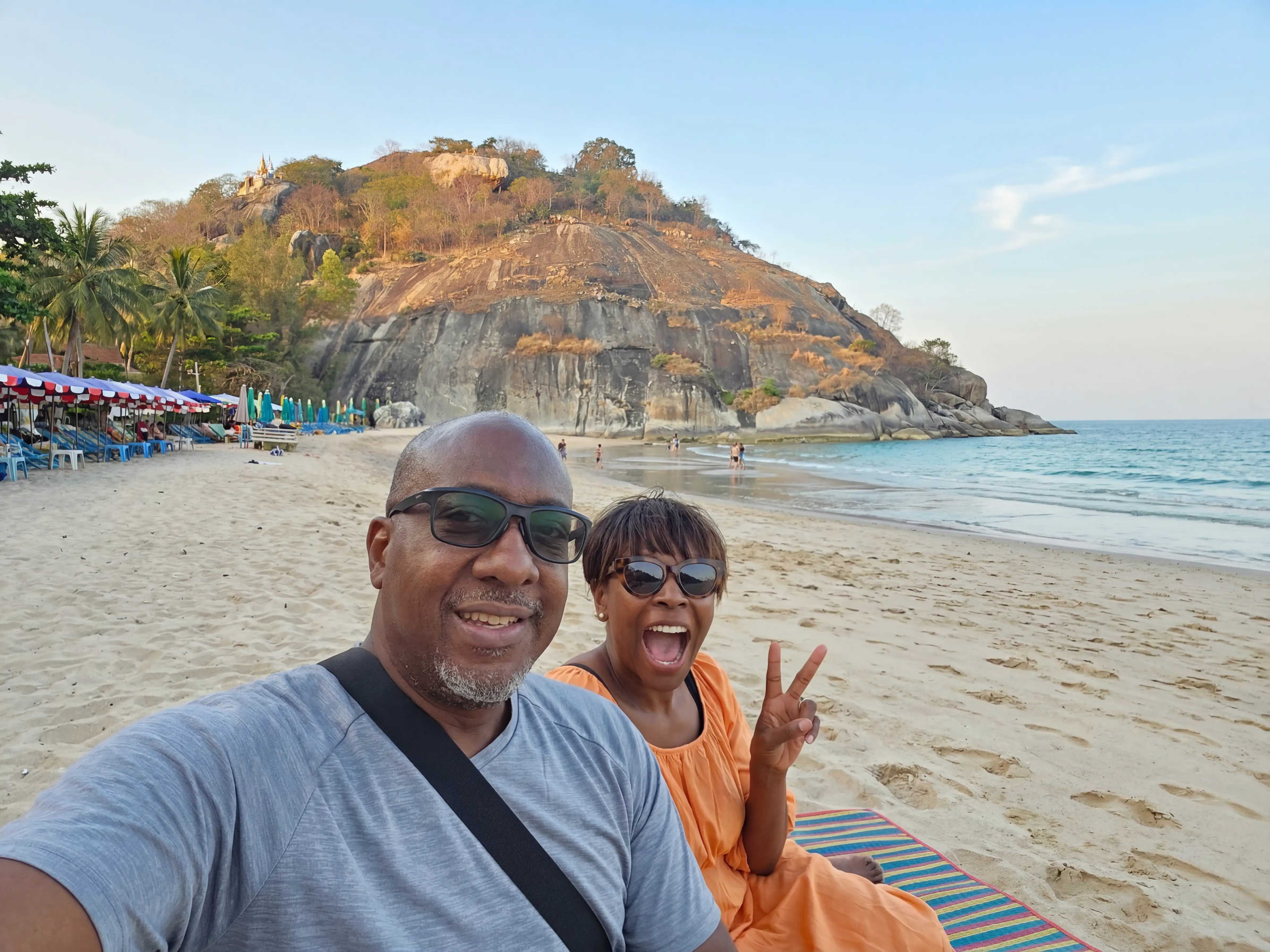 A couple posing on the beach in Hua Hin, Thailand.