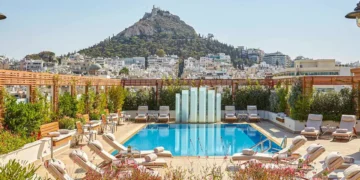 I stayed at the most famous hotel in Athens. Its rooftop restaurant with Acropolis views can’t be missed, even if you’re not a guest.