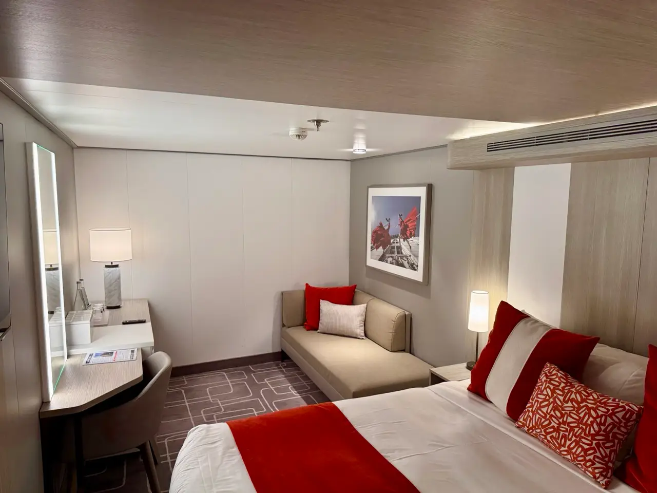 Celebrity Ascent cabin with bed, couch, vanity are