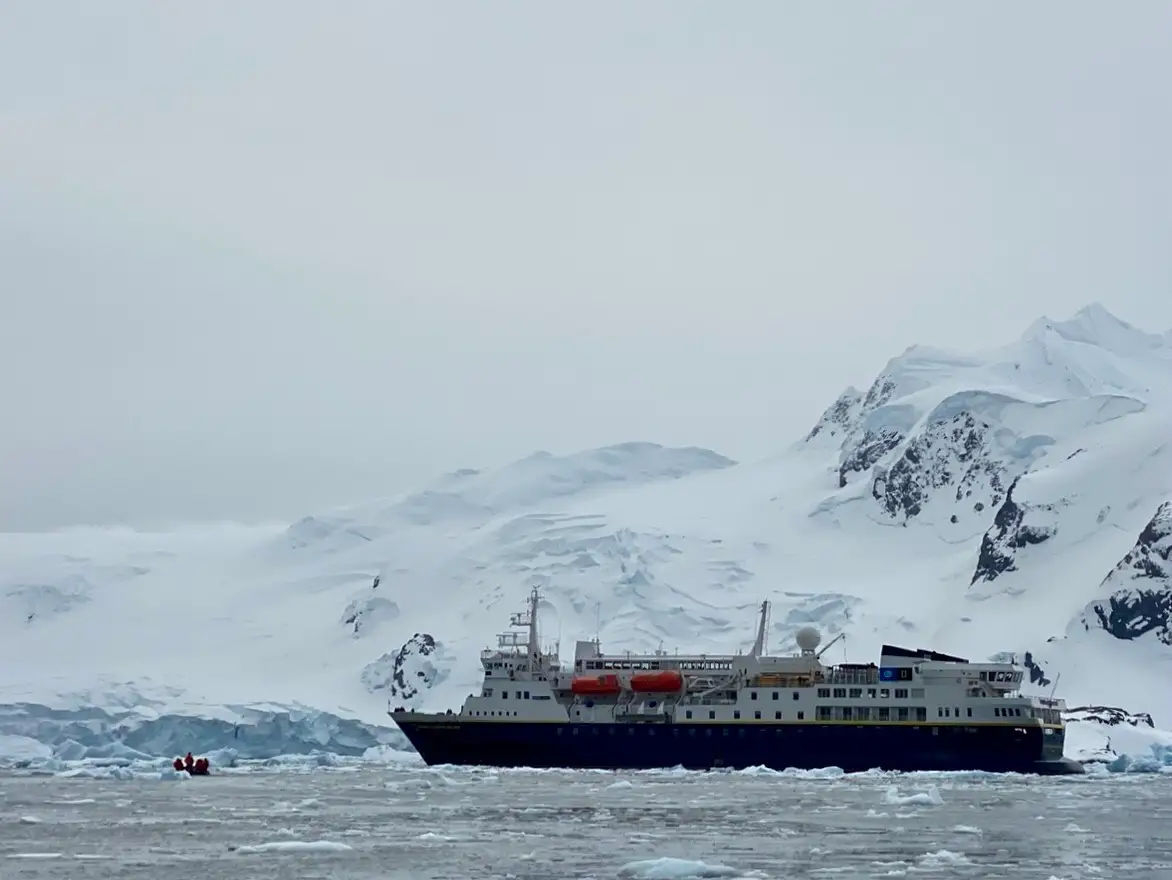 cruise ship in alaska next to ice