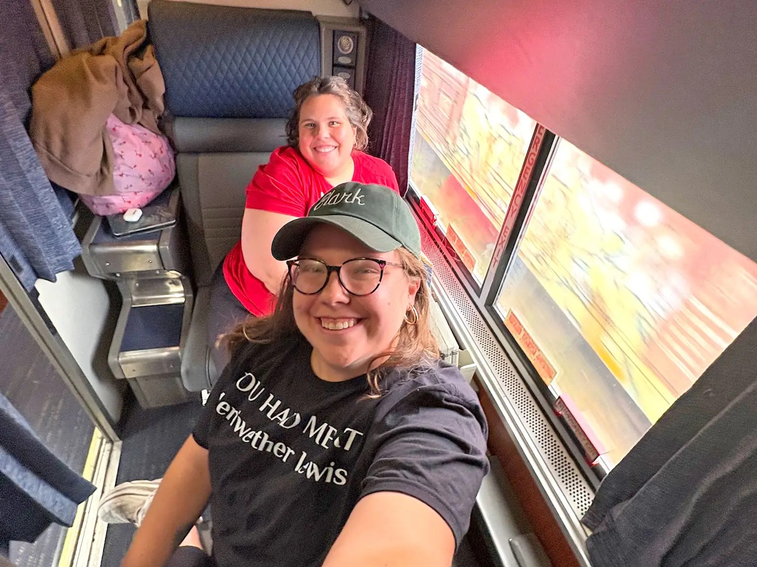 Paige and her sister take a selfie in their roomette seats.