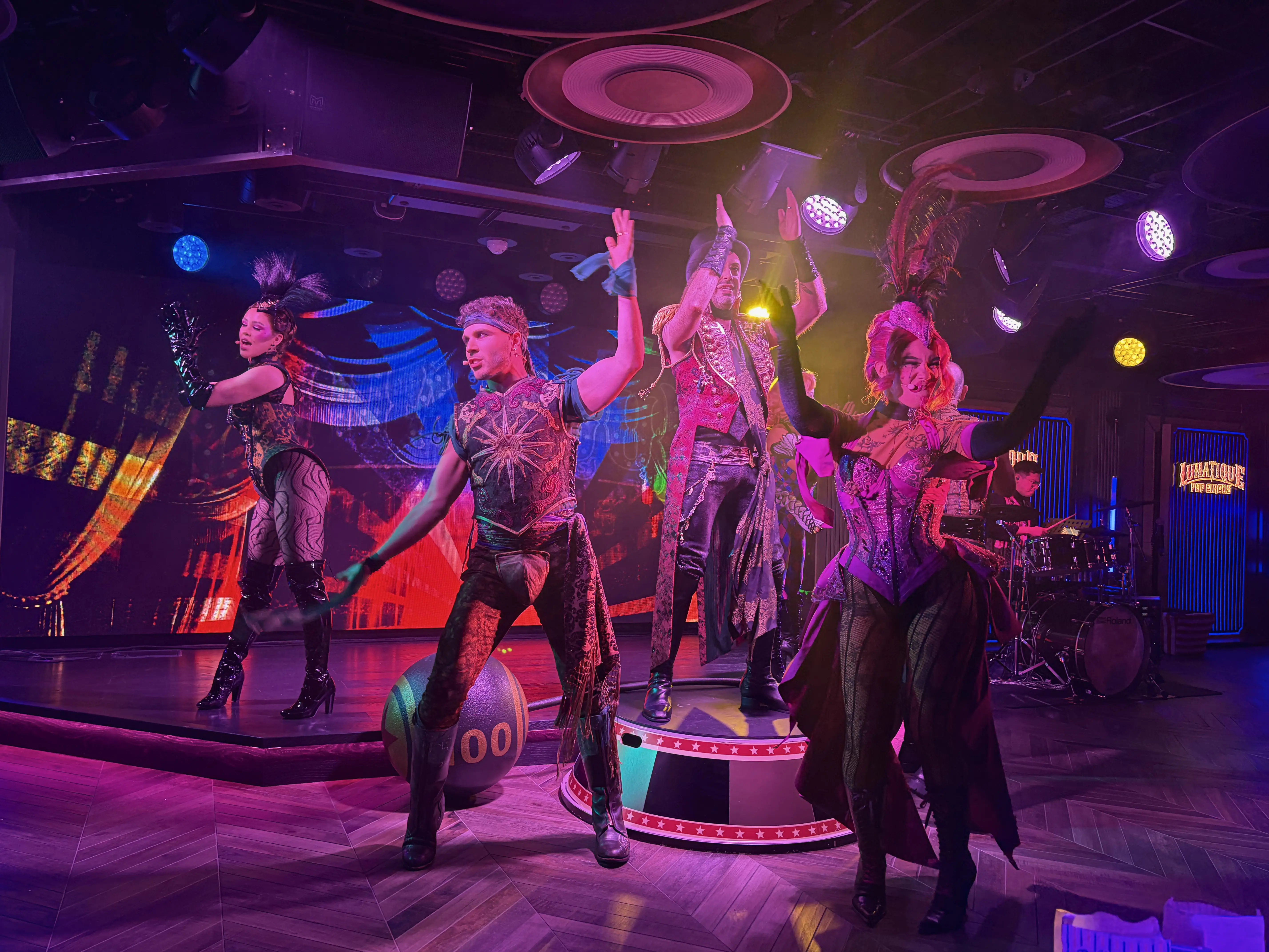 View of performers under purple lights