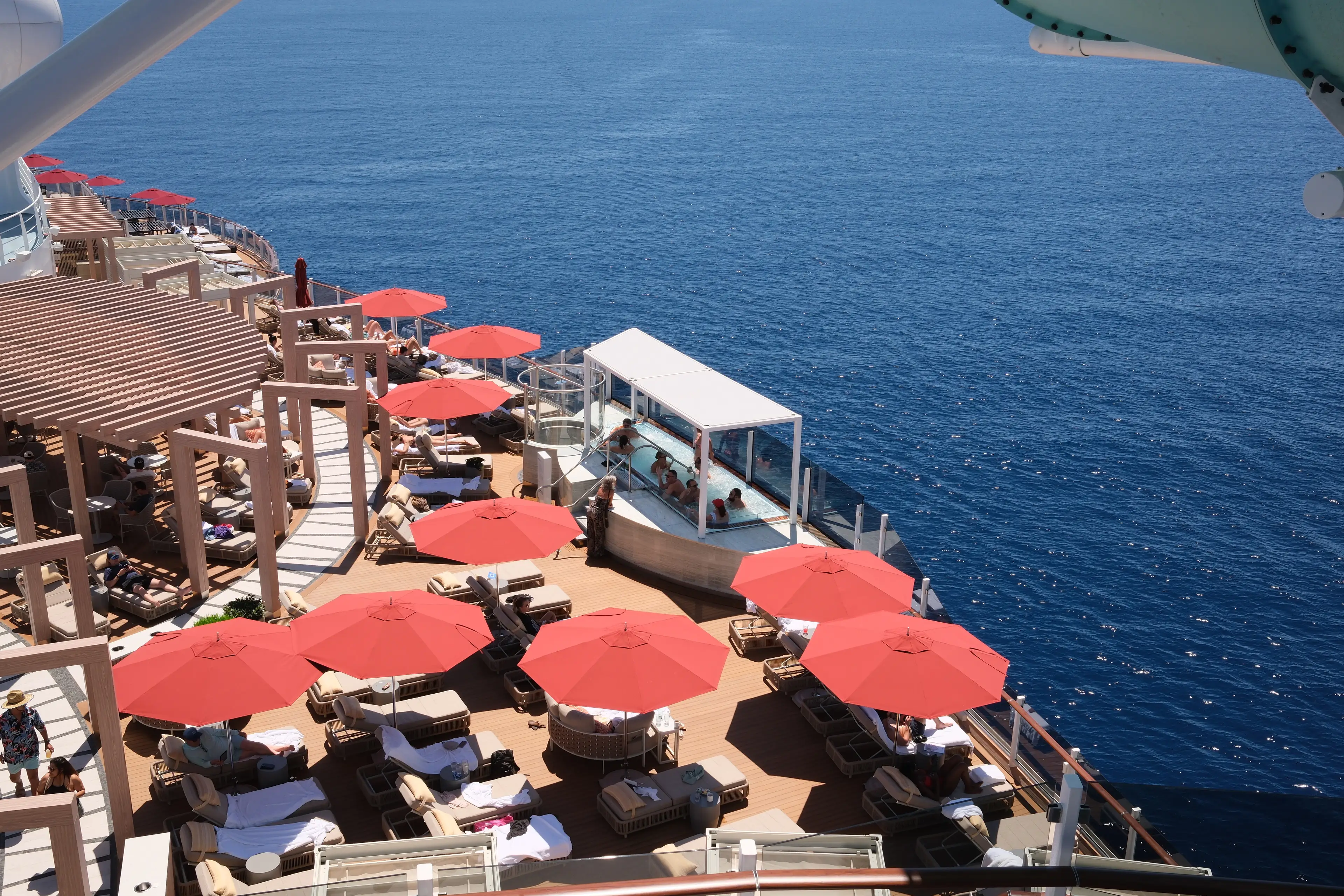 aerial view of umbrellas on cruise ship deck of norwegian luna