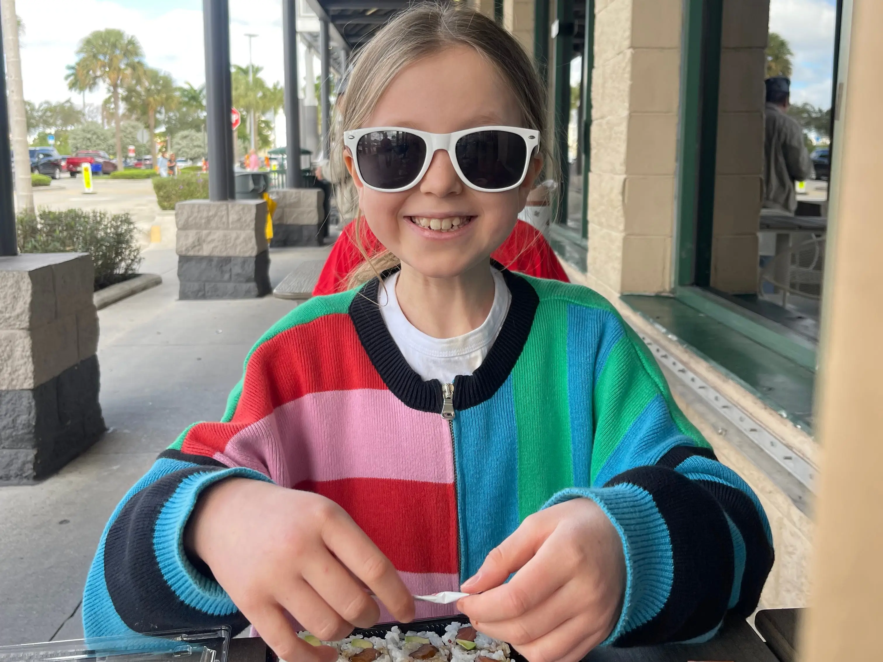 Girl eating sushi