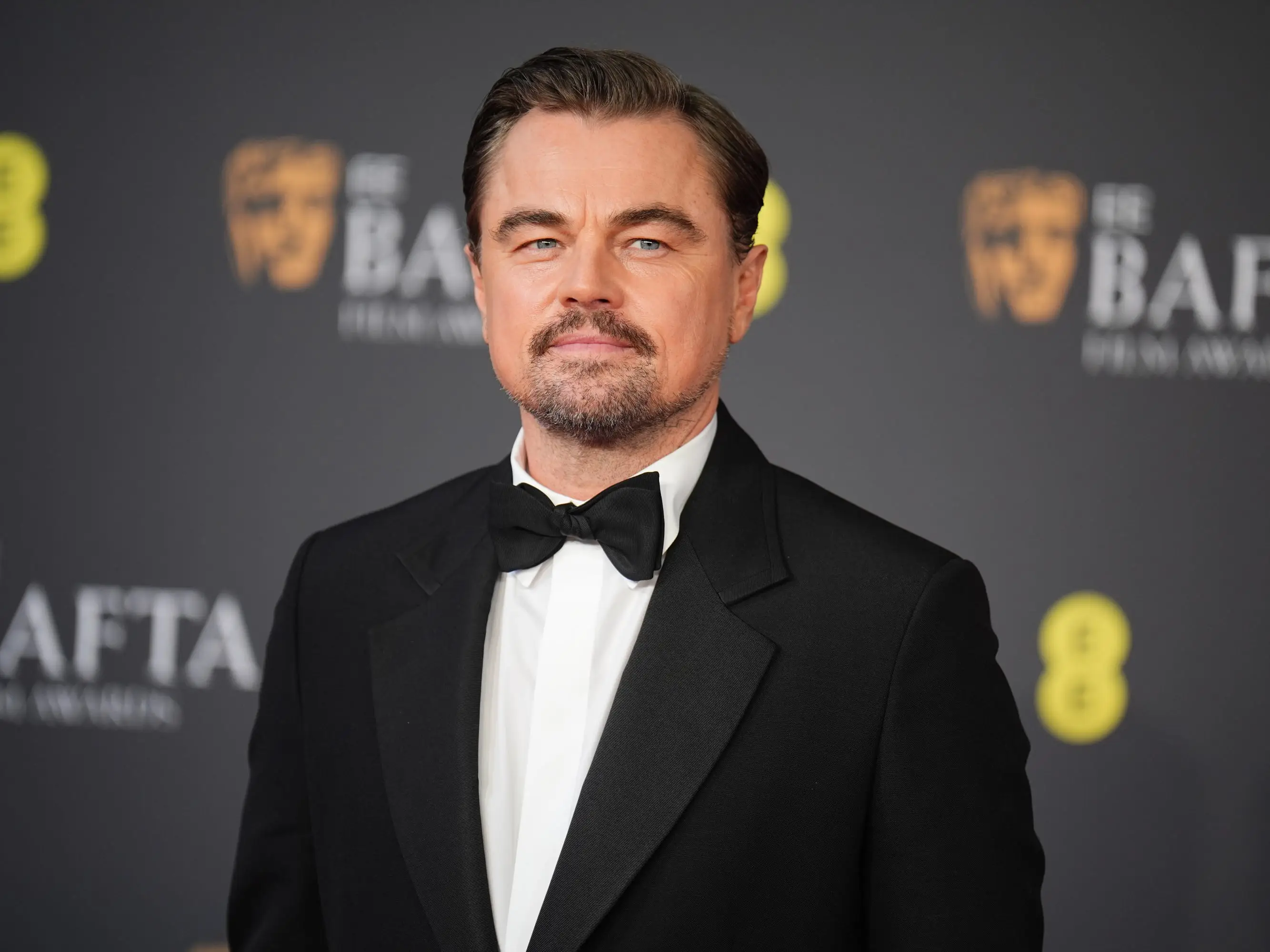 Leonardo DiCaprio in a suit with a bowtie.