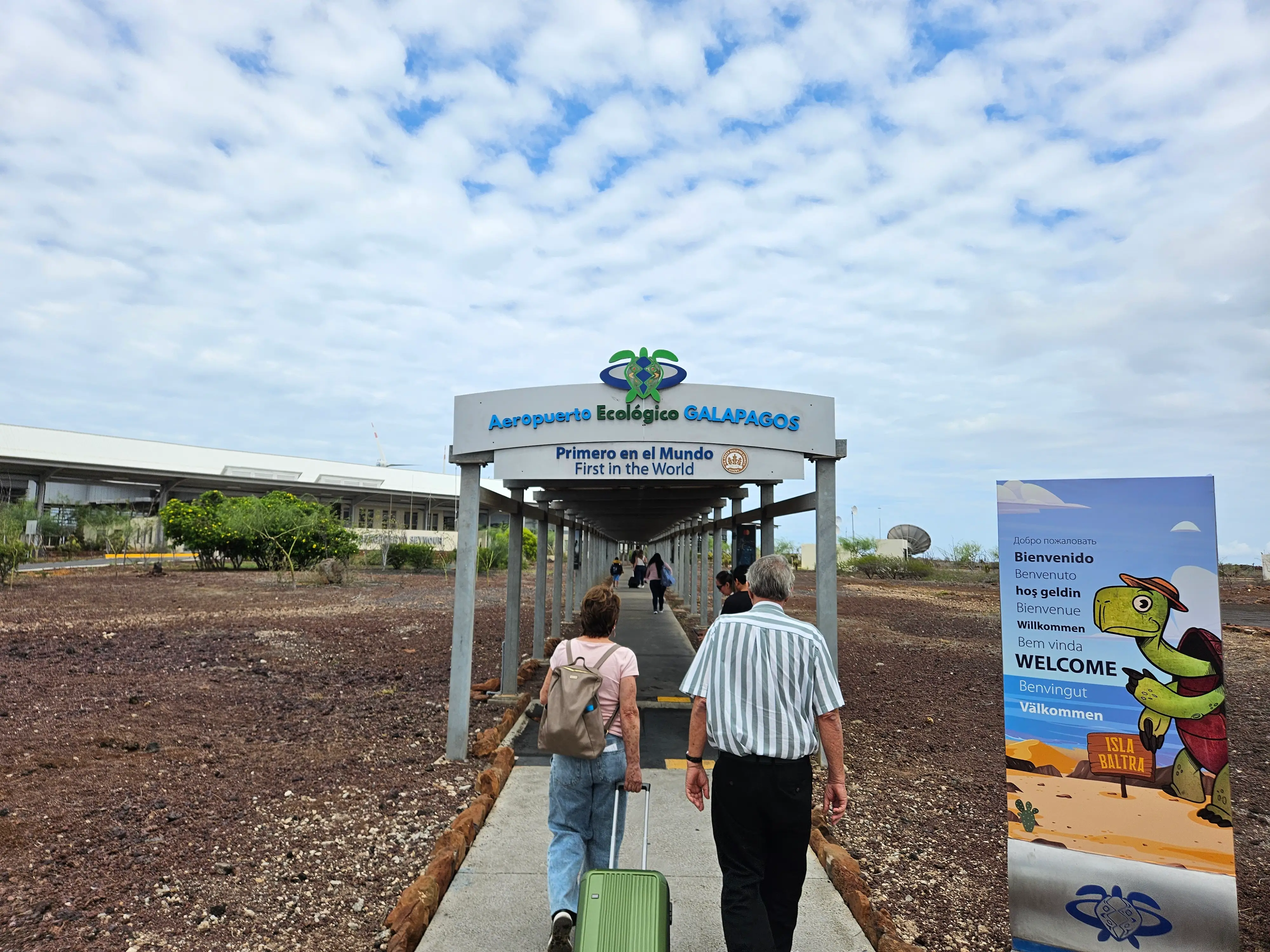 People walking through entrance of acvitity