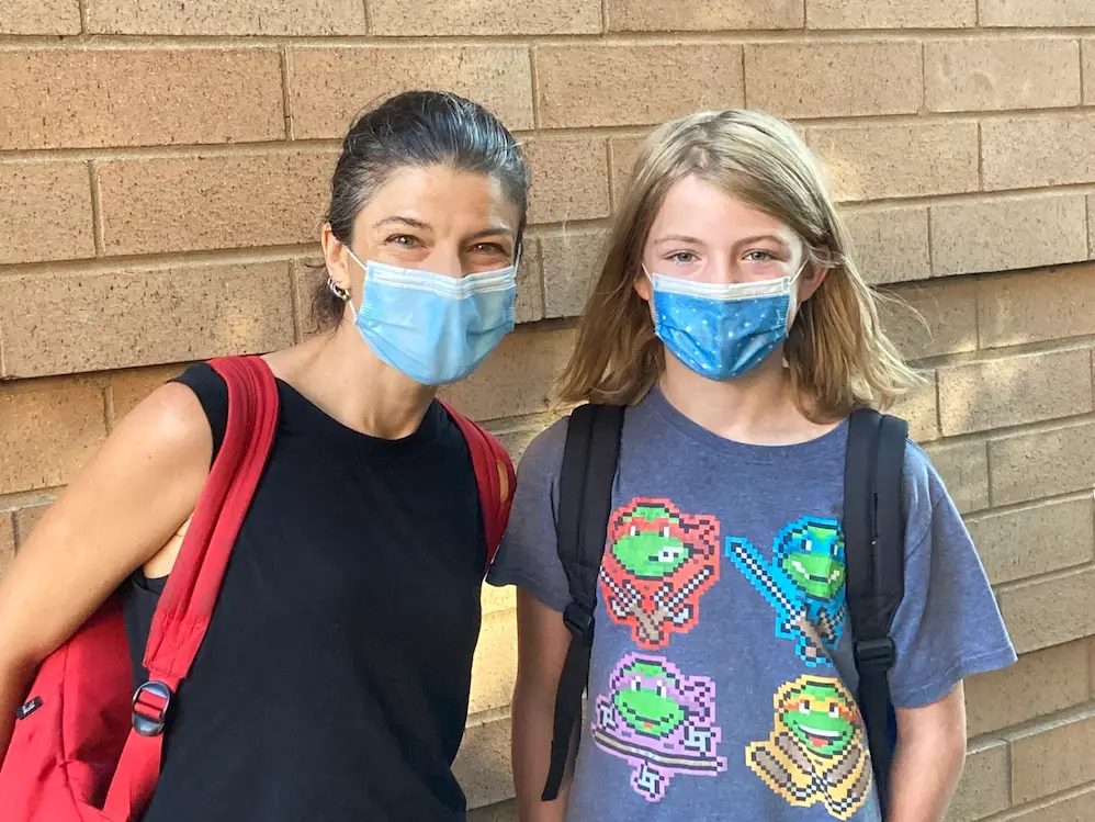 mom and child wearing masks