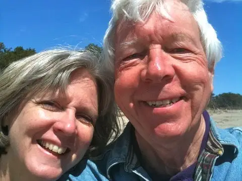 An older couple posing for a selfie