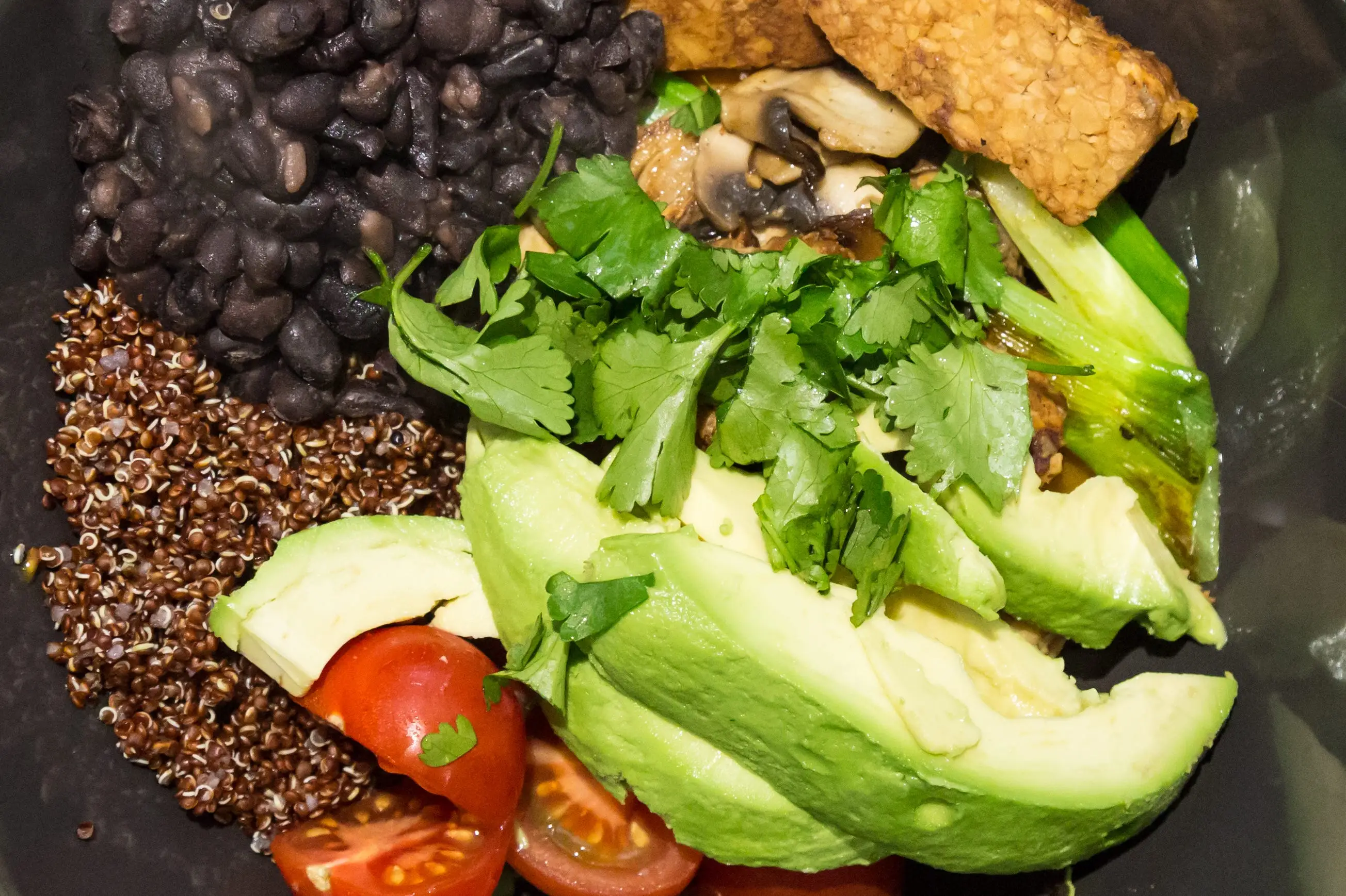 quinoa bowl with avocado and black beans