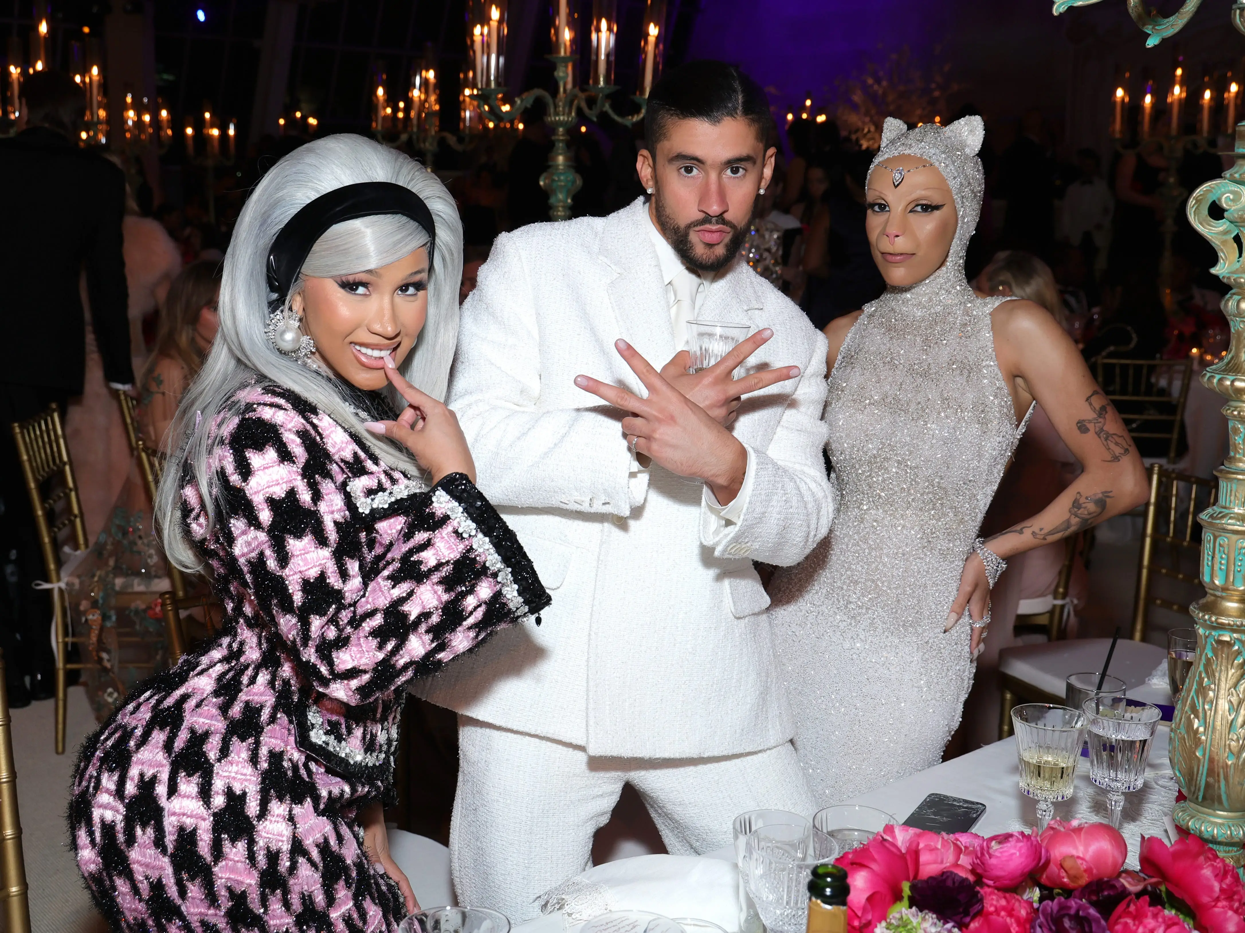 Cardi B, Bad Bunny, and Doja Cat pose inside the 2023 Met Gala.