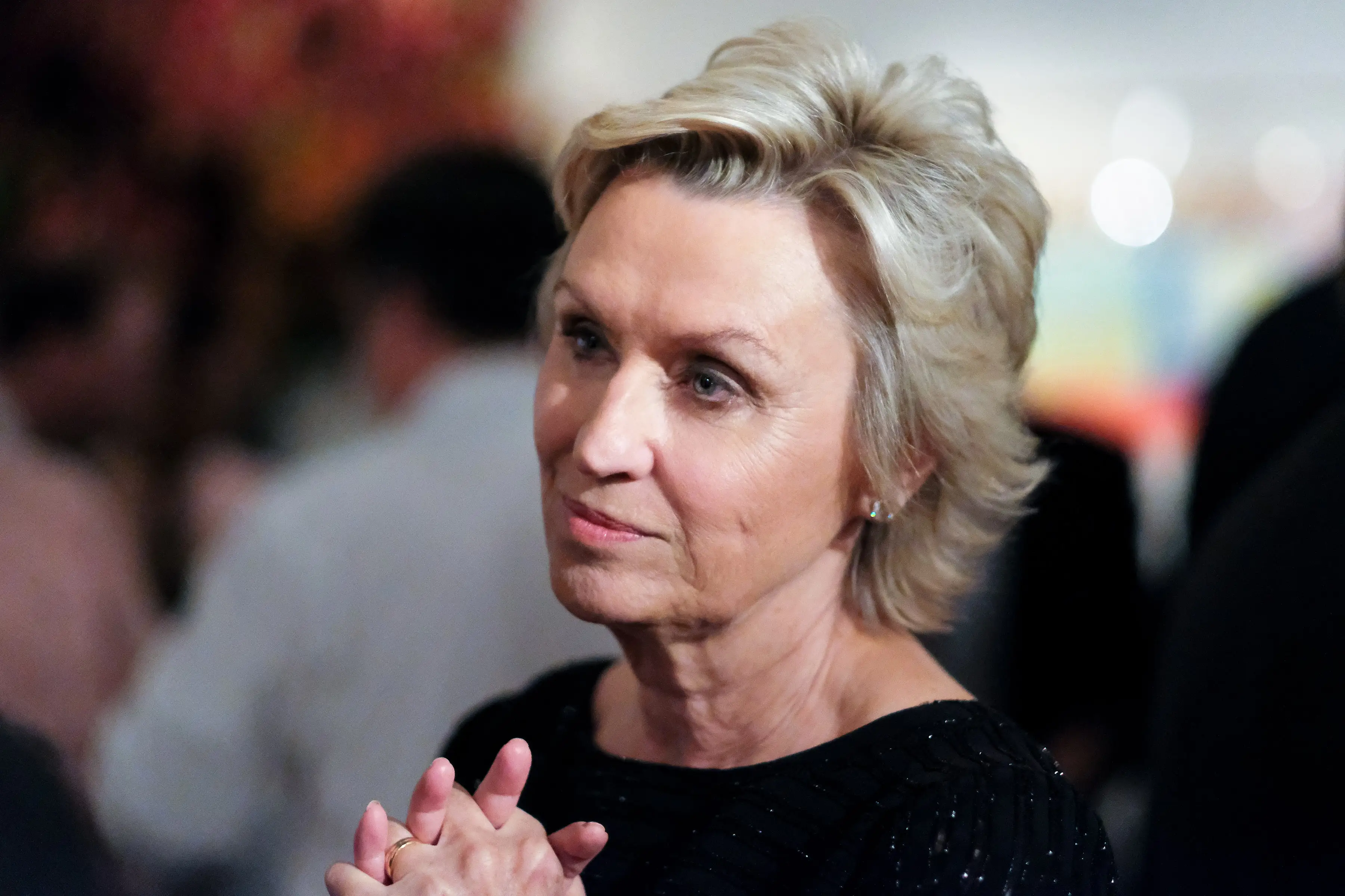 Tina Brown in a black dress