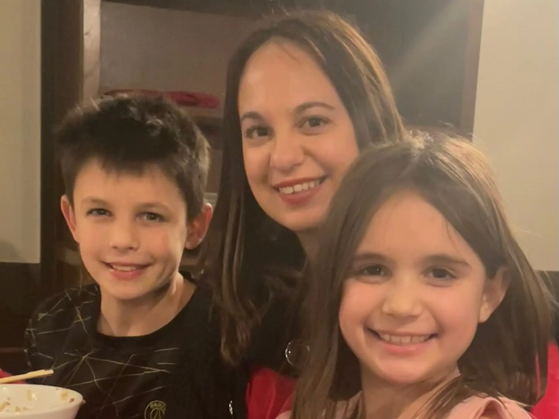 The author poses with her two children.