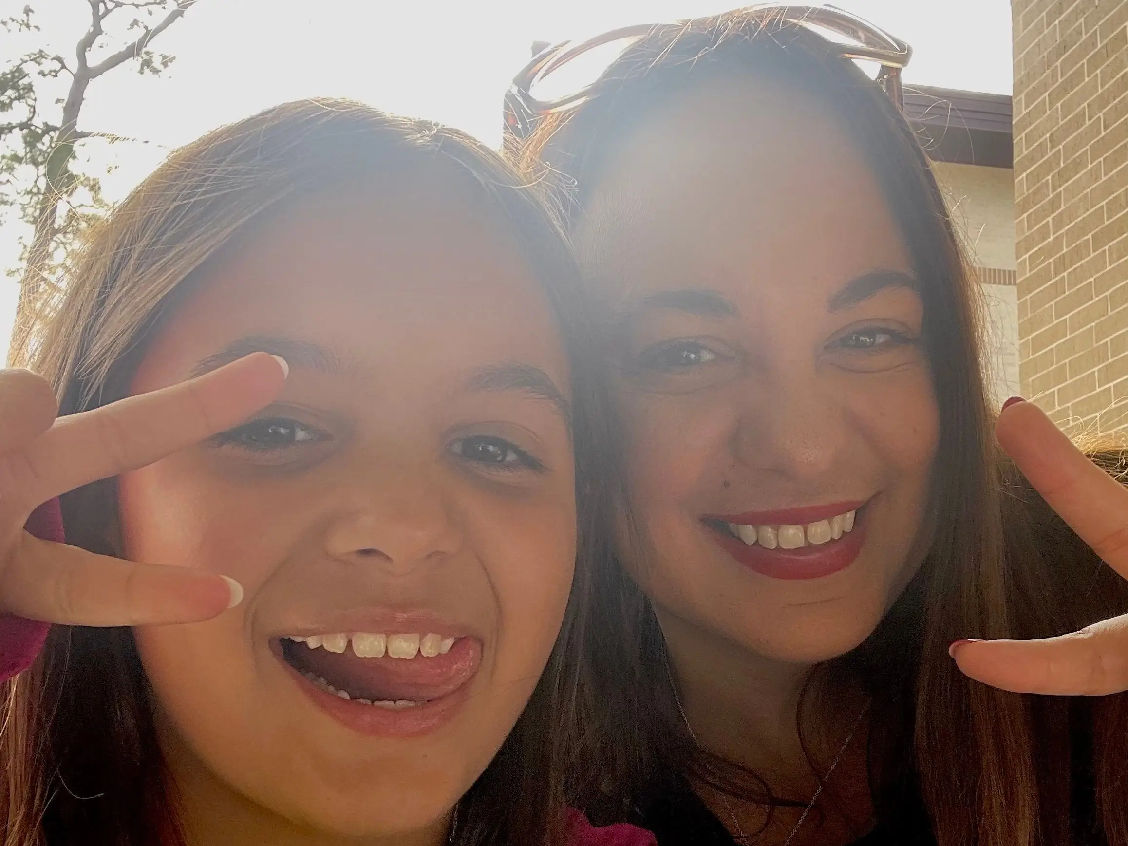 The author poses with her daughter.