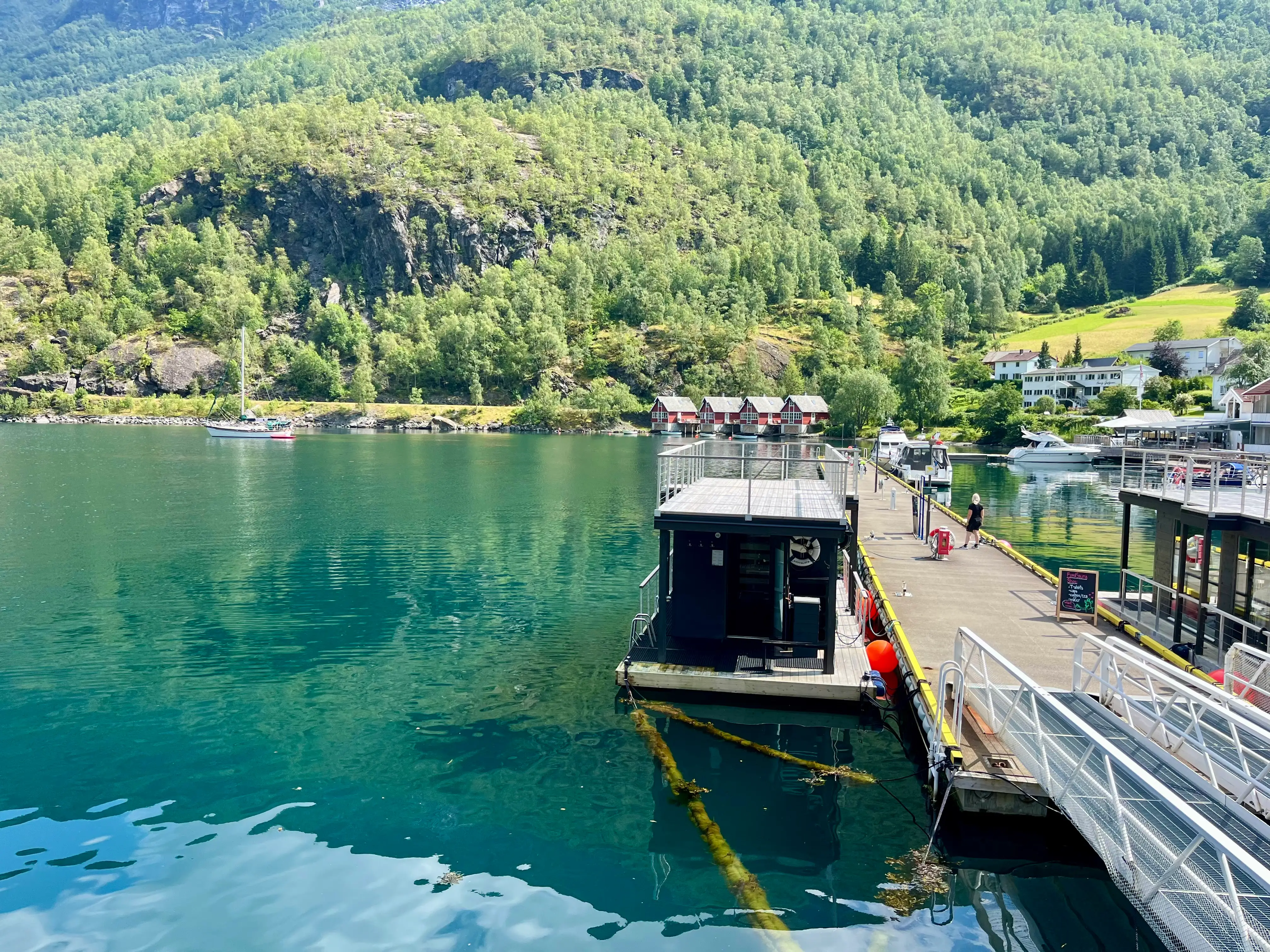 A floating sauna is docked.