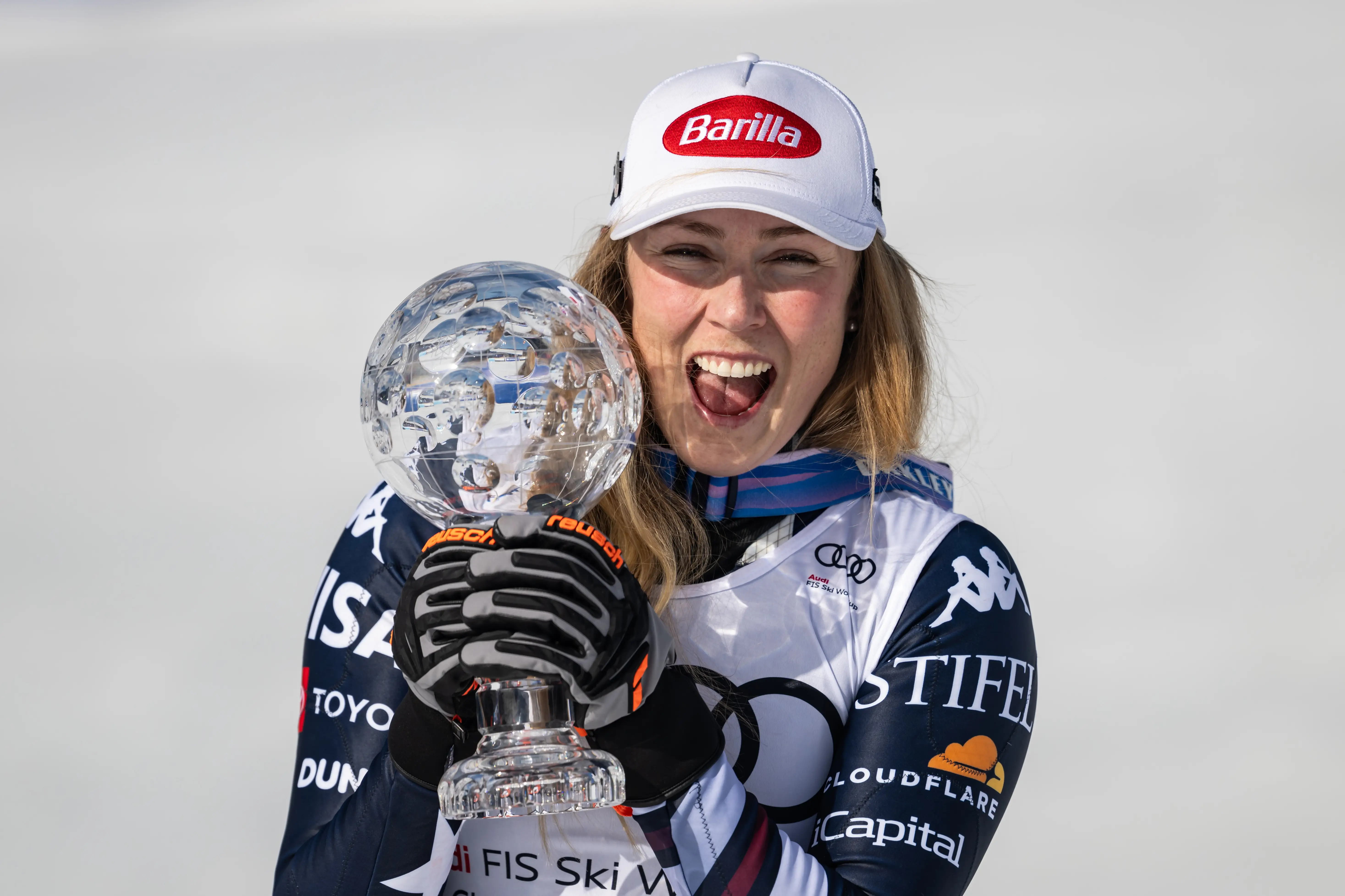 Mikaela Shiffrin holding trophy