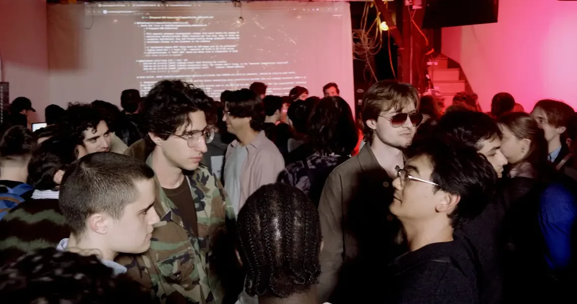 I went to an ‘AI psychosis’ party in NYC filled with zany art, vibe-coded apps, and Diet Coke