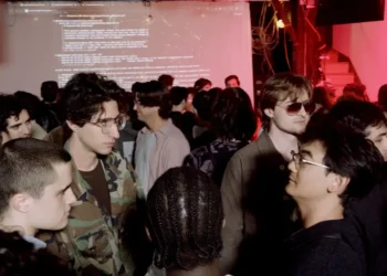 I went to an ‘AI psychosis’ party in NYC filled with zany art, vibe-coded apps, and Diet Coke