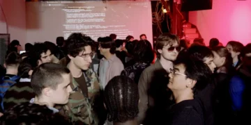 I went to an ‘AI psychosis’ party in NYC filled with zany art, vibe-coded apps, and Diet Coke
