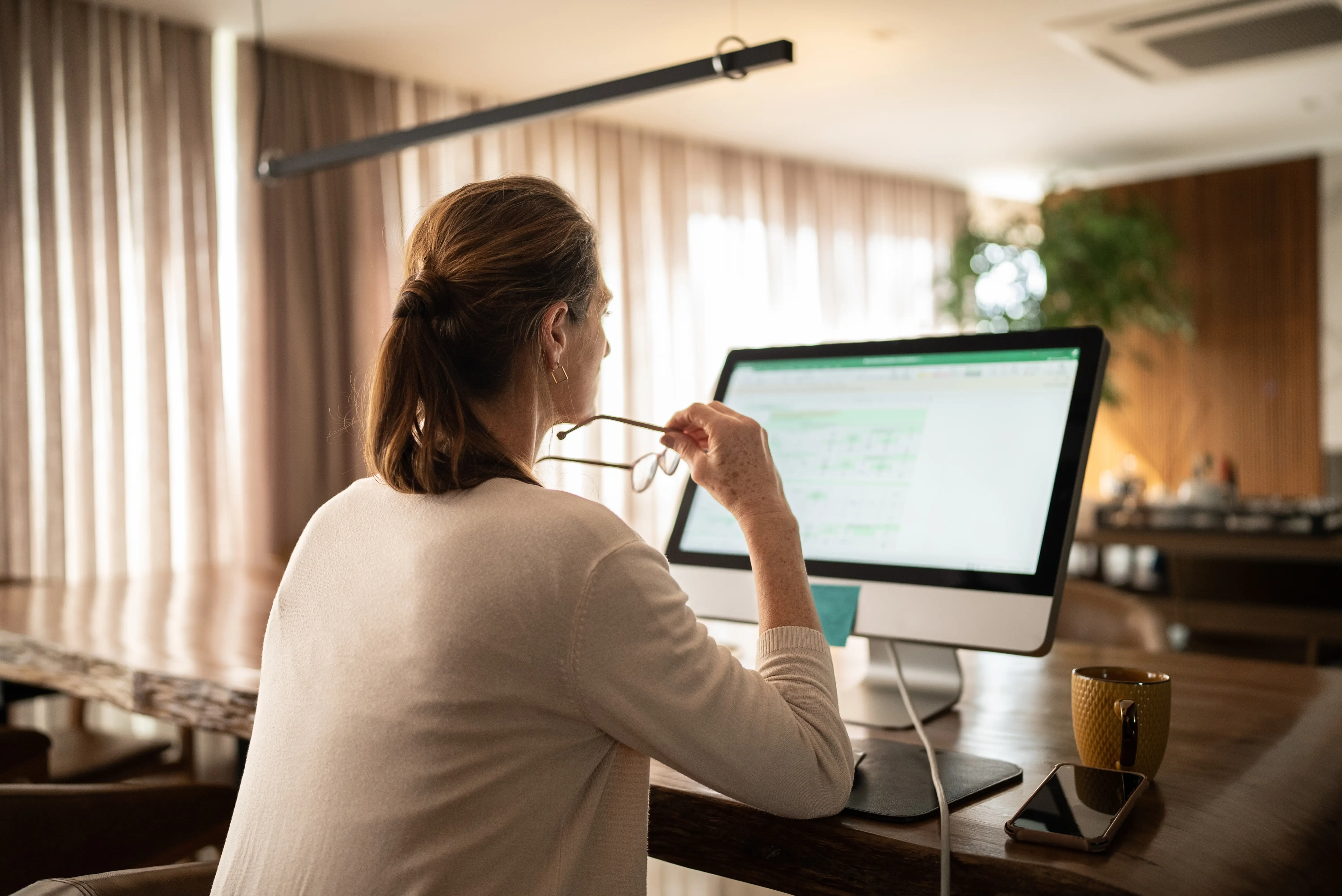woman staring at computer screen