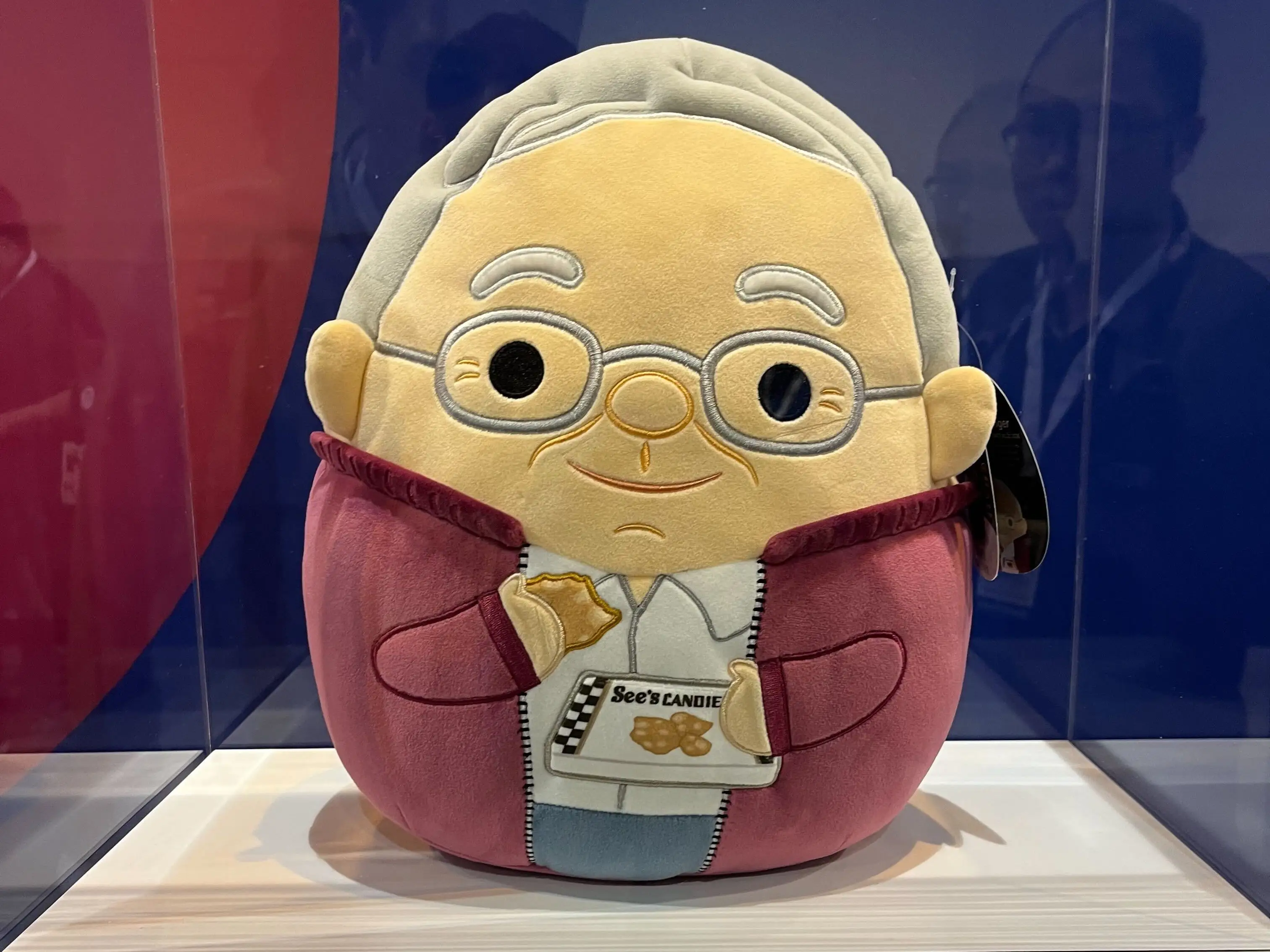 A Charlie Munger Squishmallow from See's Candies.