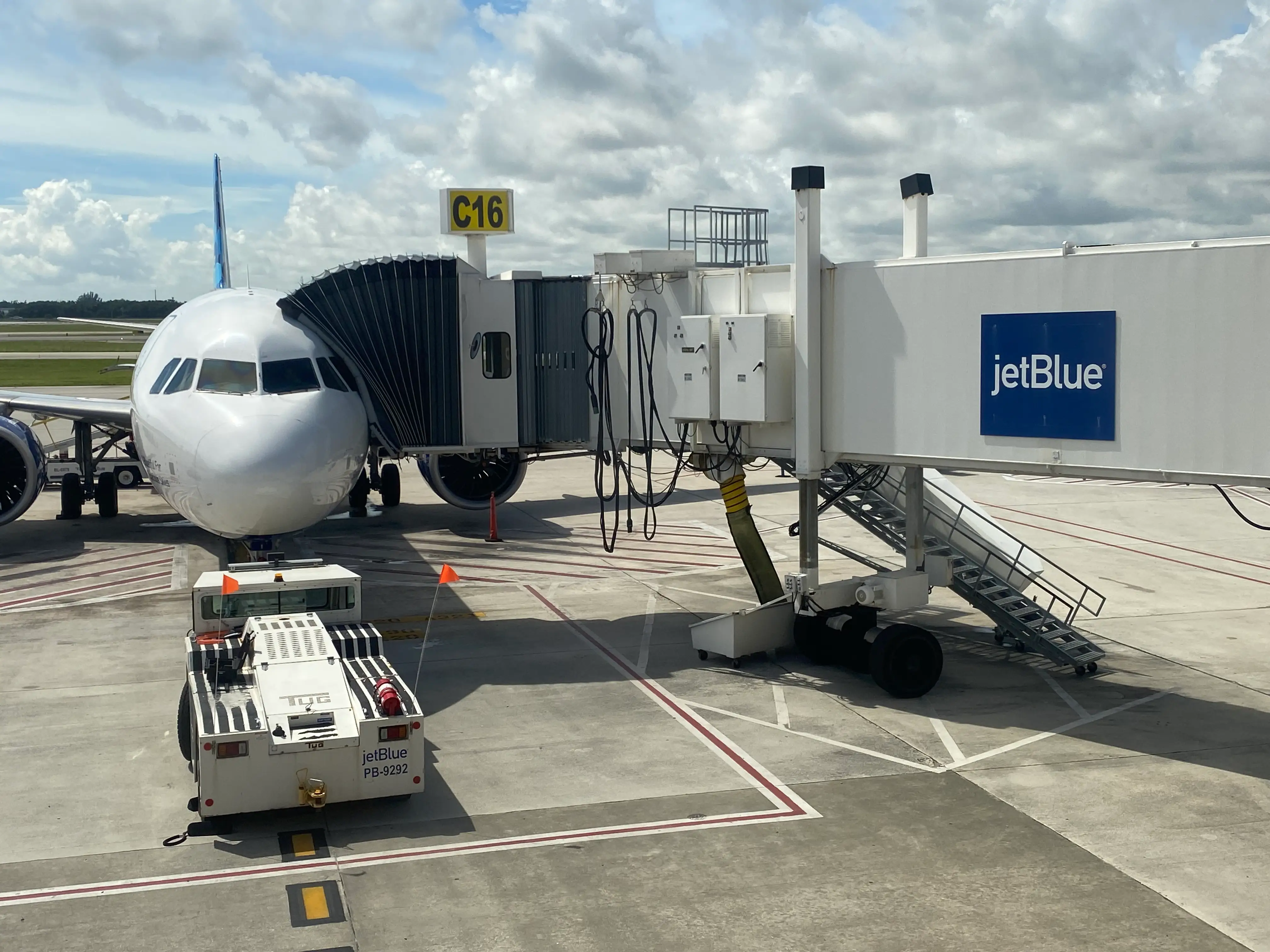 JetBlue airplane at gate waiting for boarding, Palm Beach International Airport, Florida.
