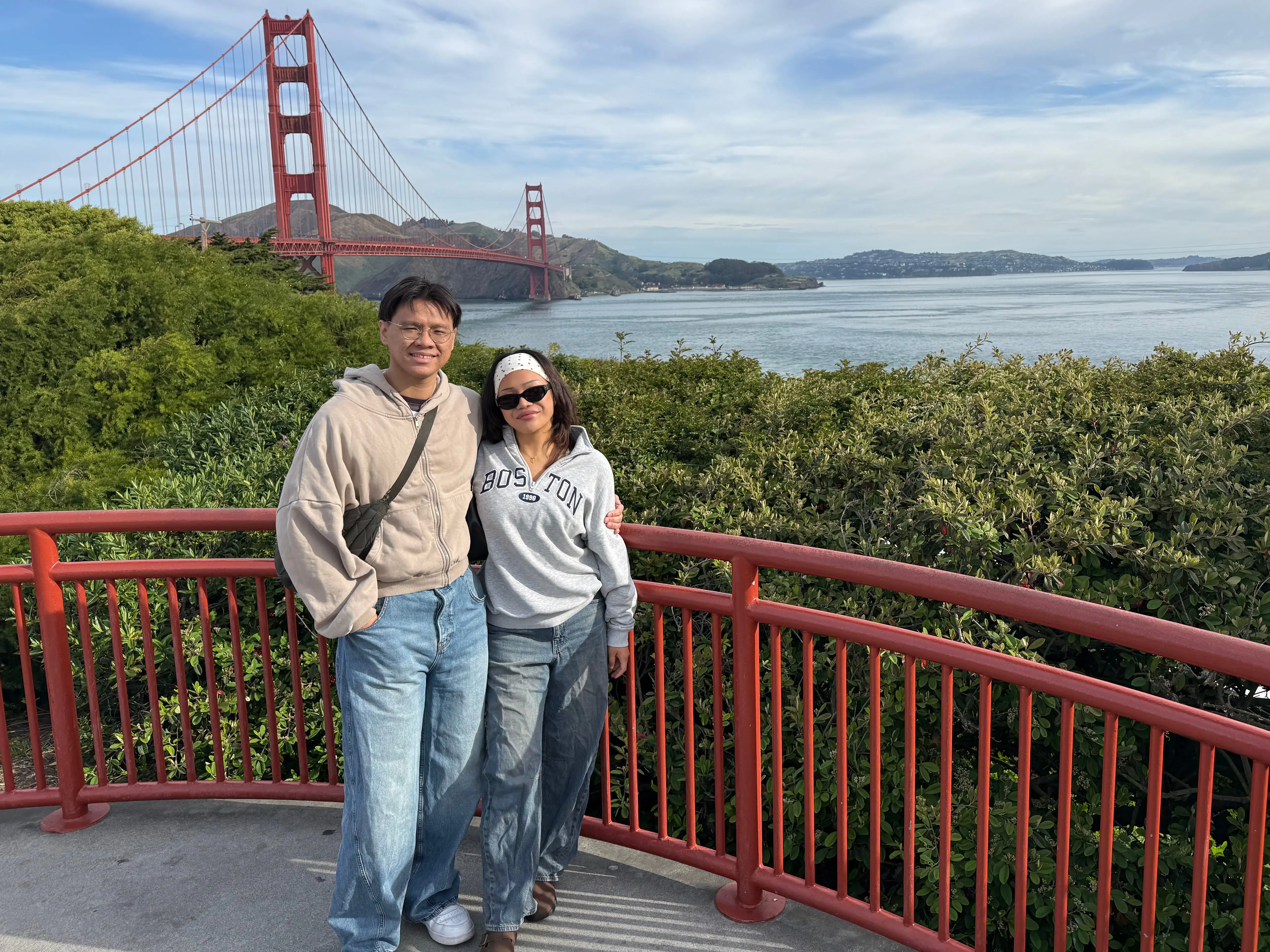 Nicole Liel with her husband in front of the Golden Gate Bridge.
