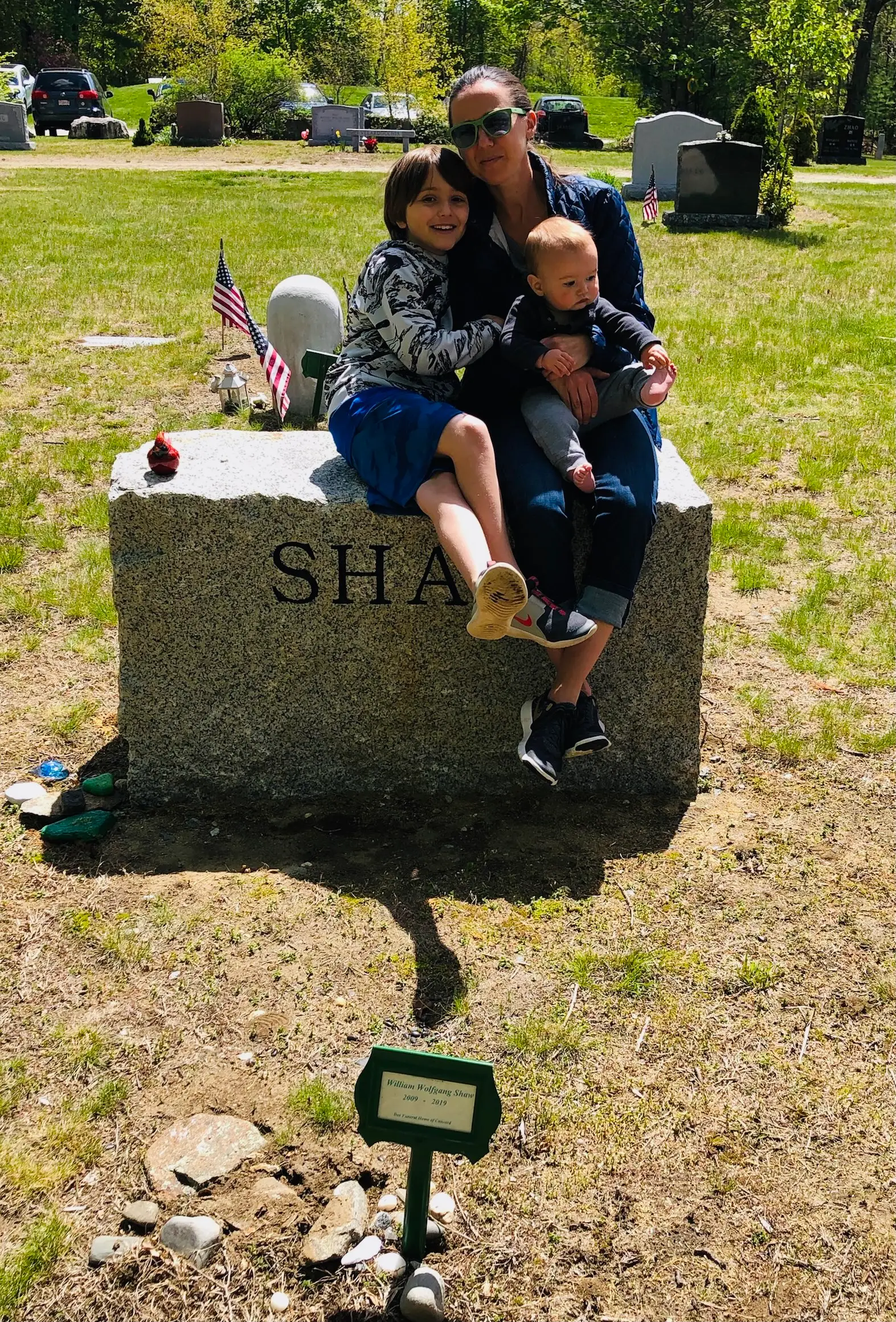 The author and her sons at the cemetery.