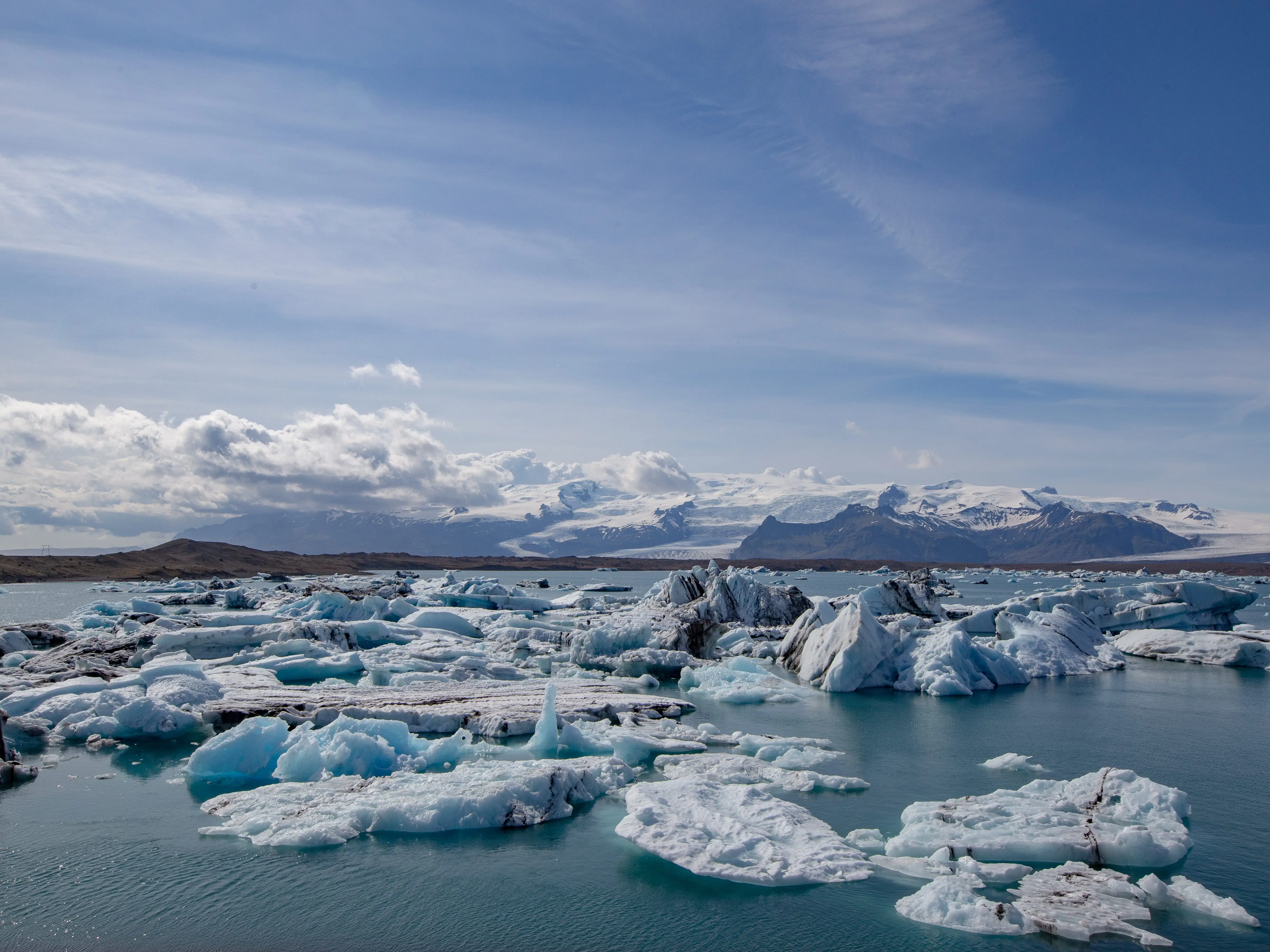 Ice formations and glaciers bobbing in the sea at Iceland's Jökulsárlón Glacier Lagoon.