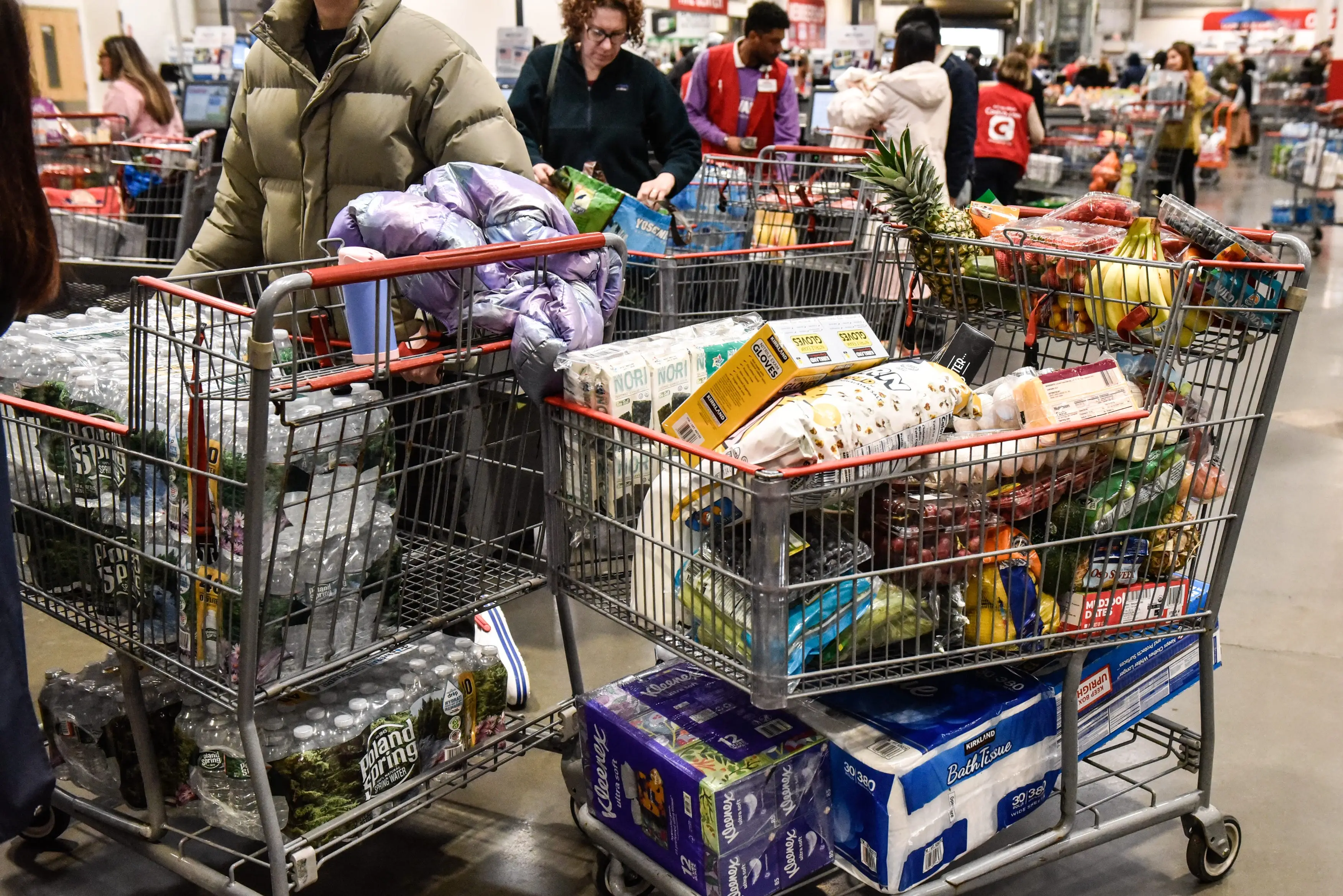 Shopping carts in the check-out line at a Costco store in Teterboro, New Jersey.