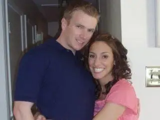 Couple posing for photo